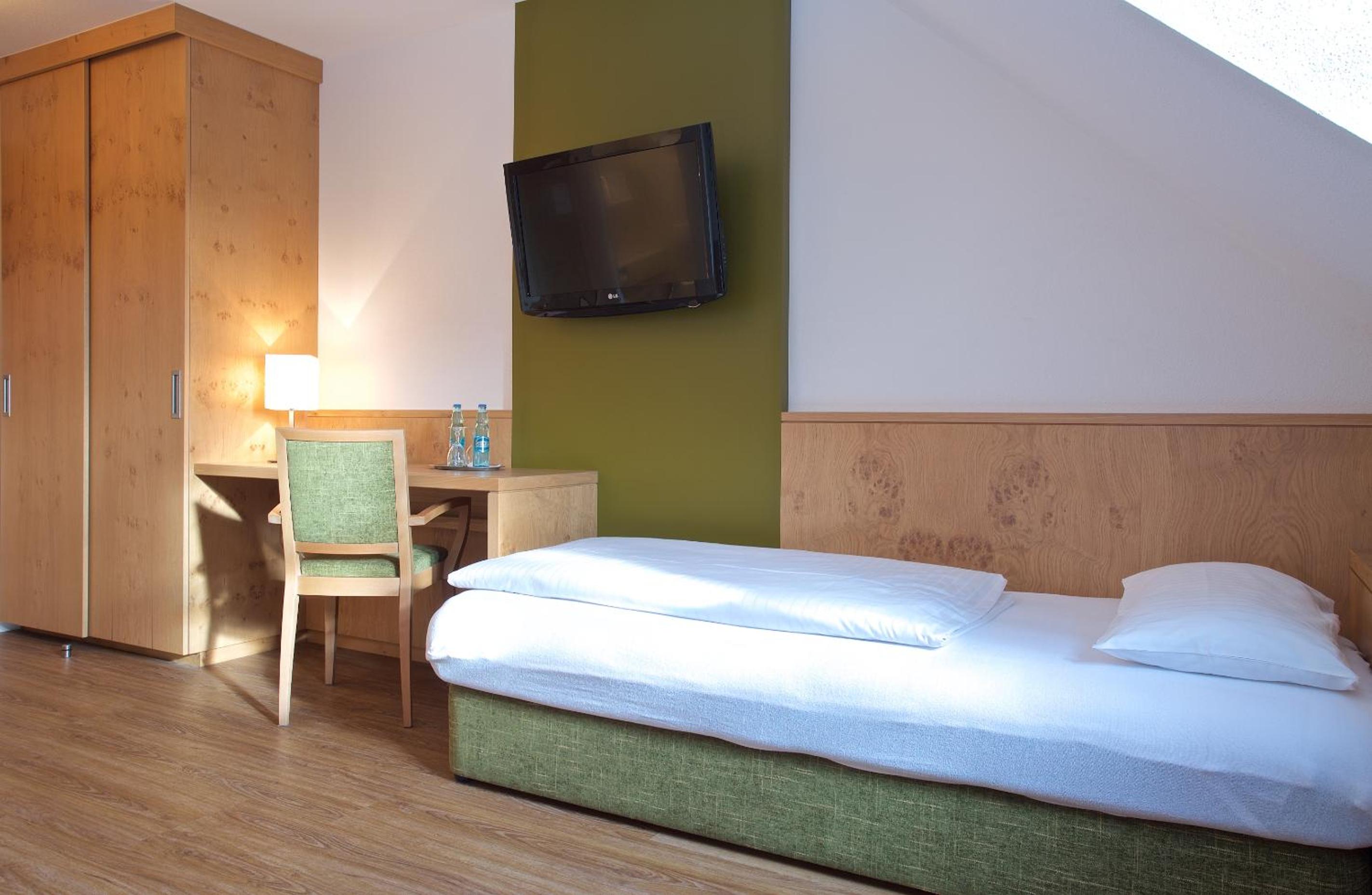 Twin Room (1 Single Bed + 1 Sofa Bed)