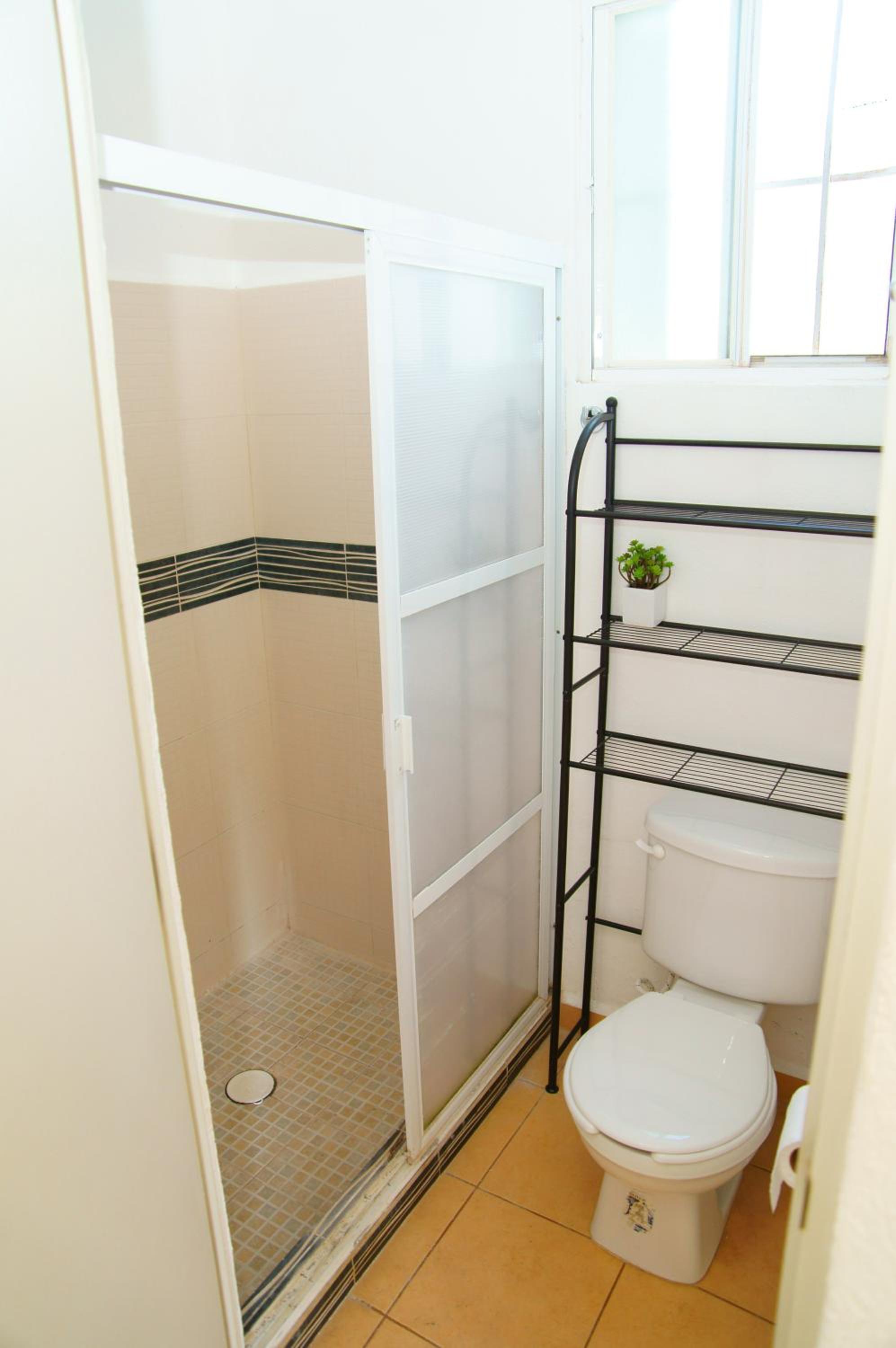 Three-Bedroom House - Photo 17