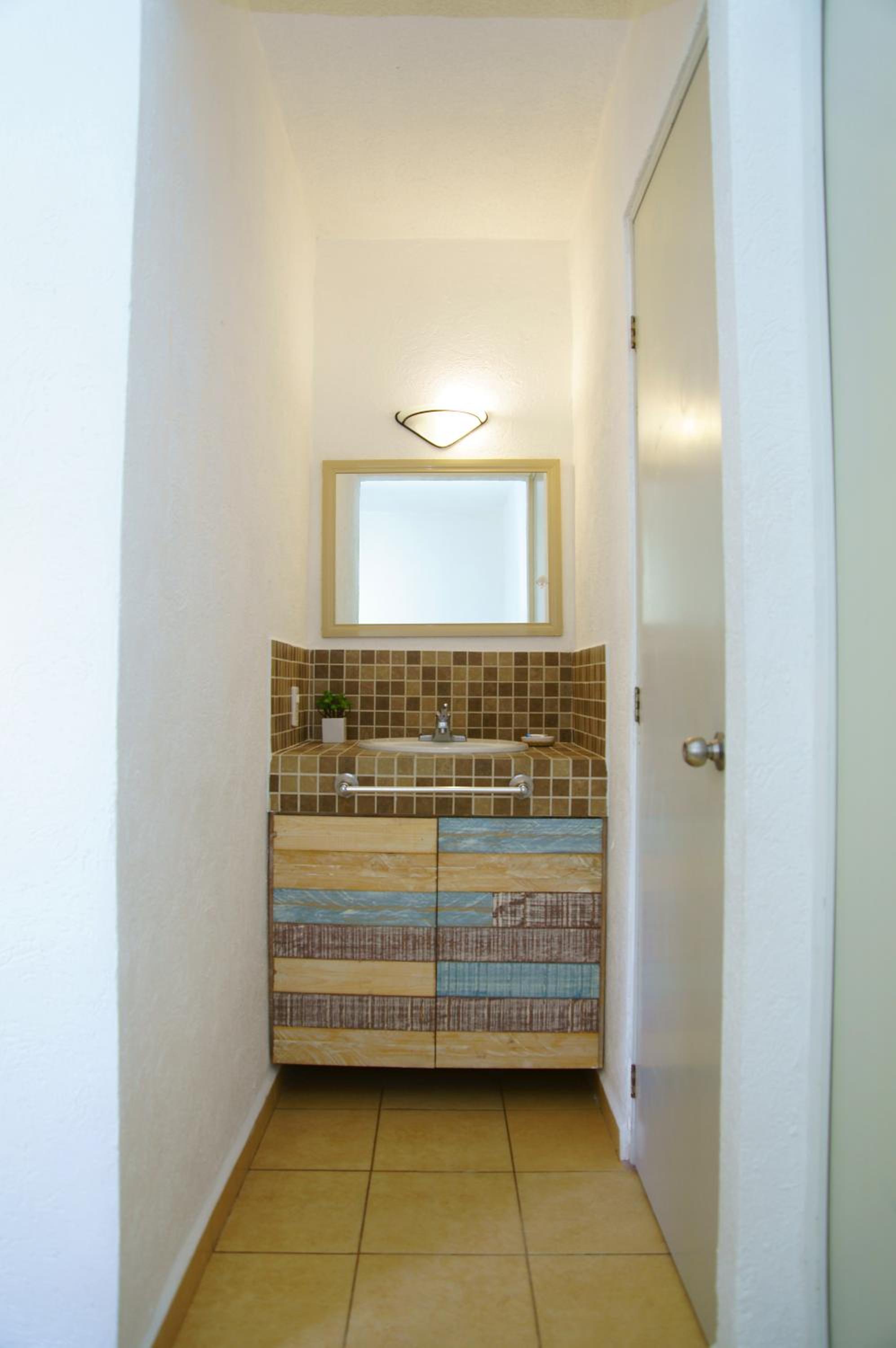 Three-Bedroom House - Photo 18