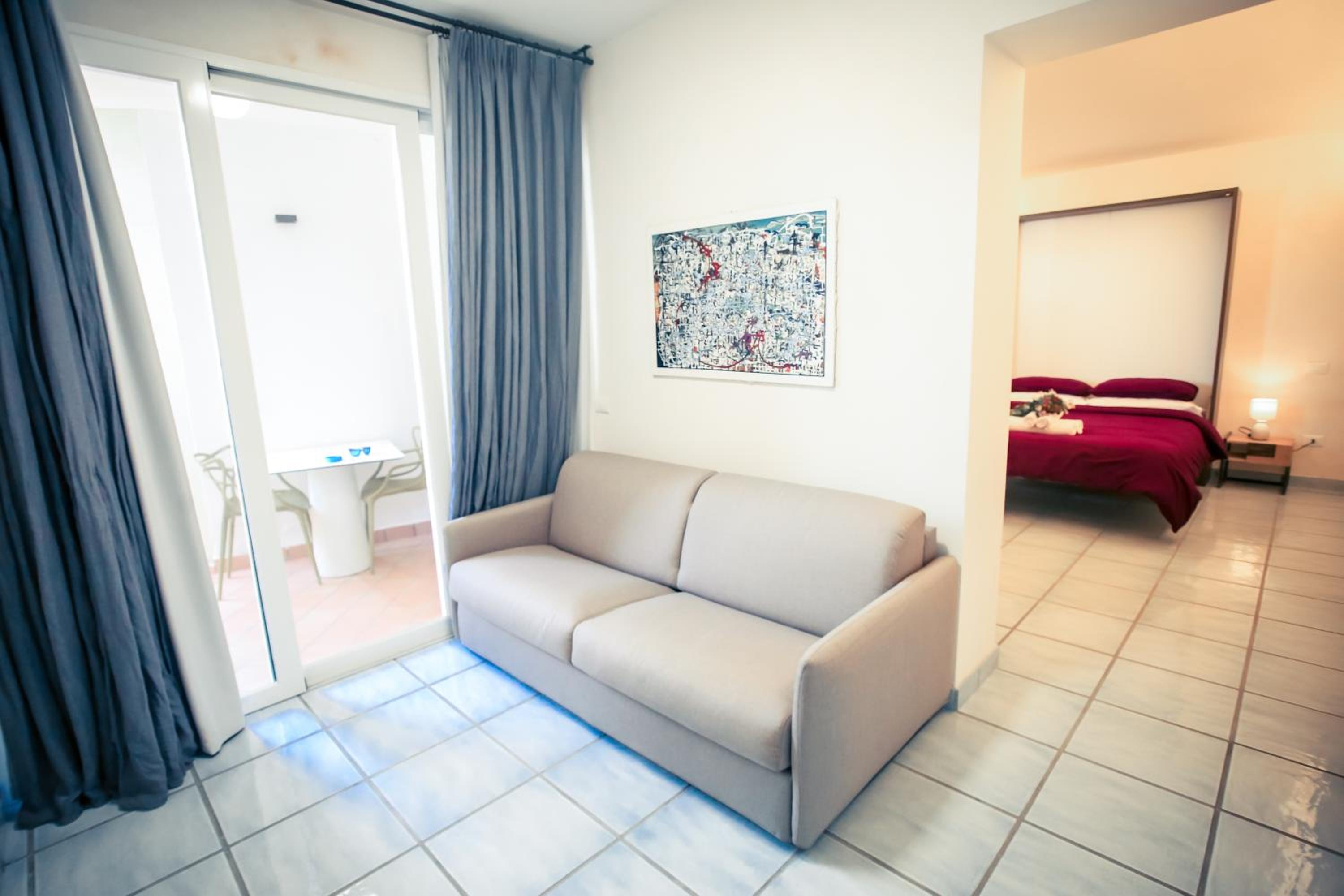 King Suite with Balcony - Photo 1