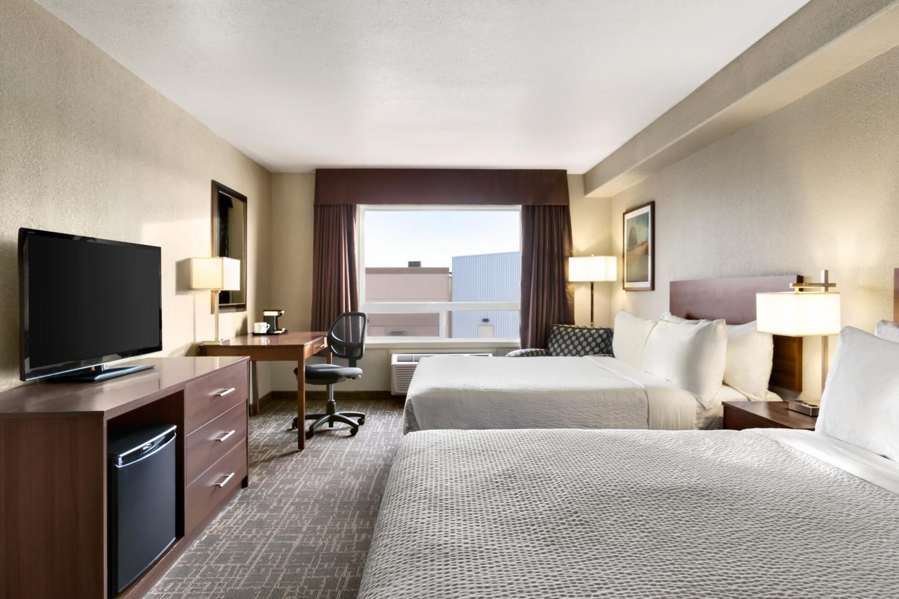Deluxe Queen Room with Two Queen Beds - Non-Smoking photo 1