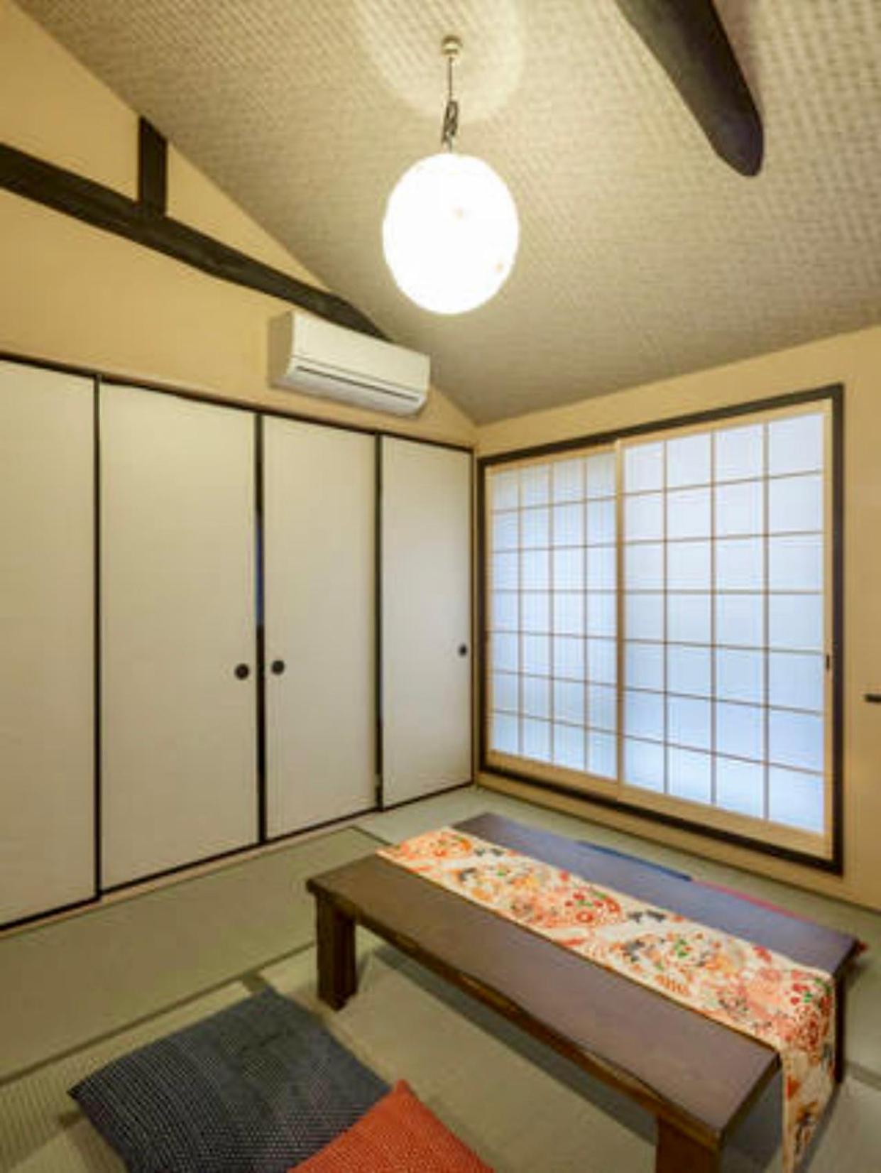 Three-Bedroom House - Photo 16