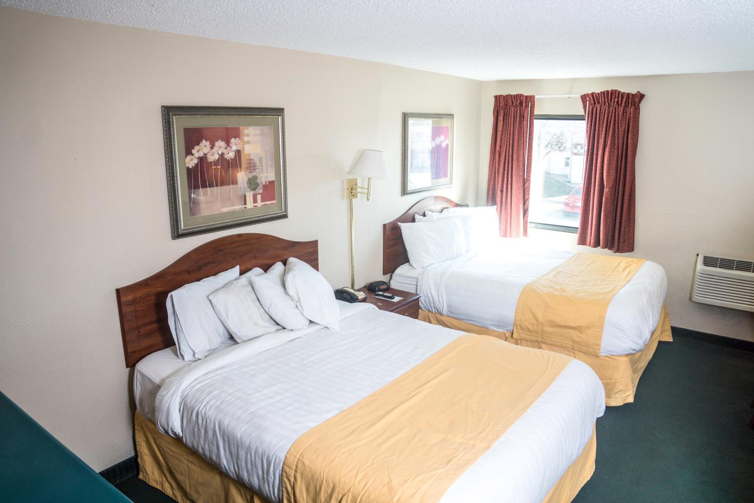 Queen Room with Two Queen Beds - Photo 1