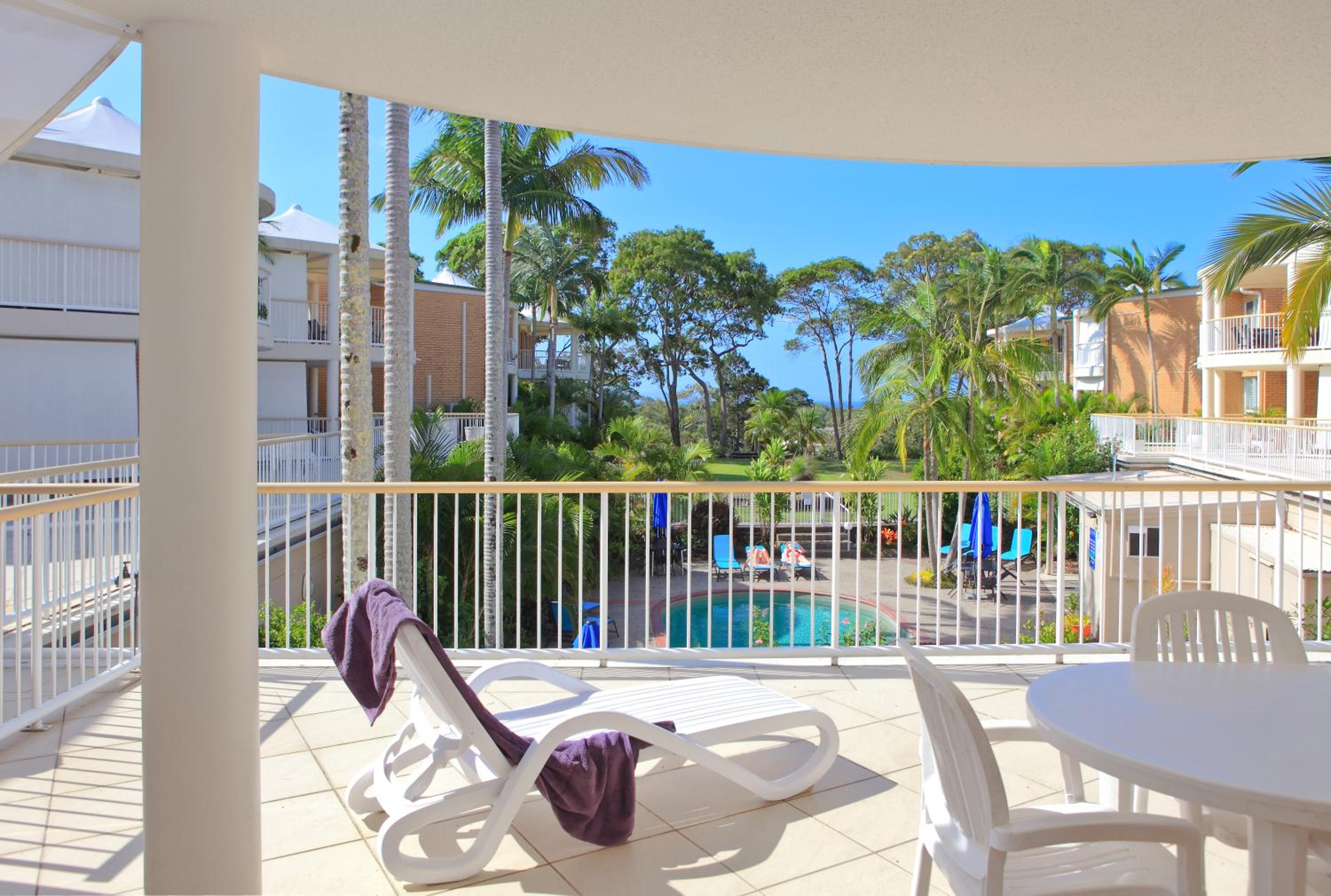 Three-Bedroom Apartment with Balcony - Photo 21