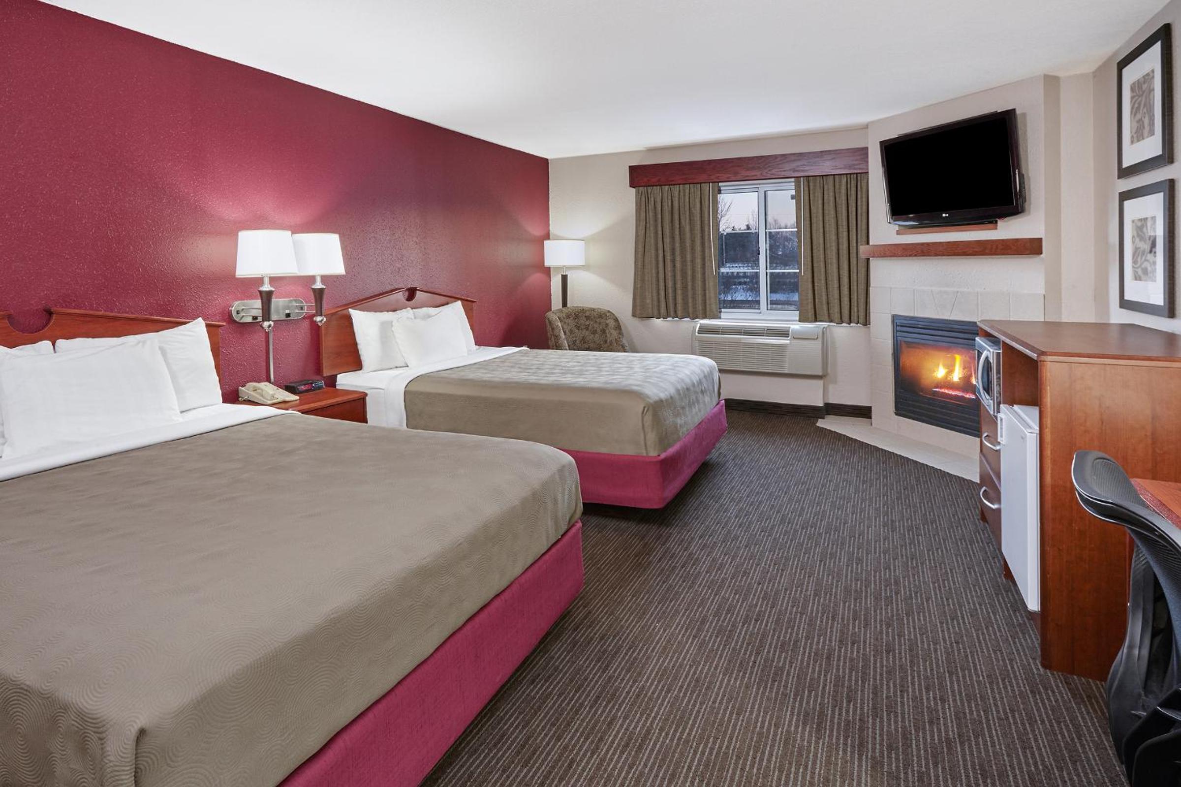 Deluxe Queen Room with Two Queen Beds - Non-Smoking photo 1