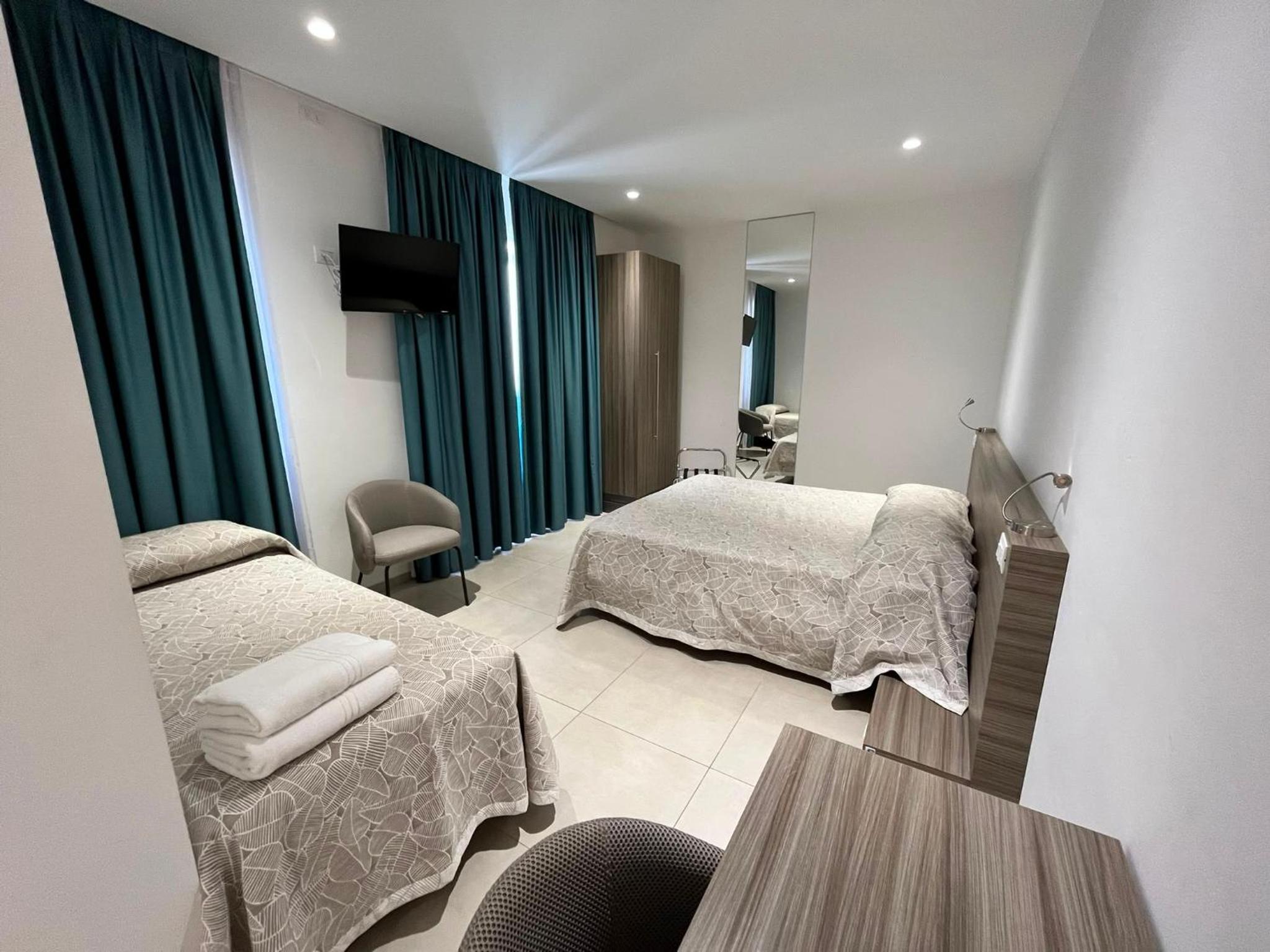 Deluxe Triple Room