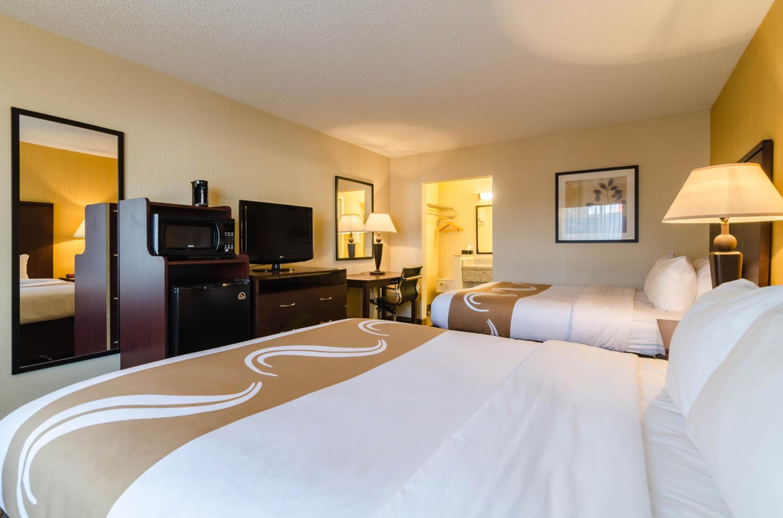 Standard Queen Room with Two Queen Beds - Non-Smoking photo 1