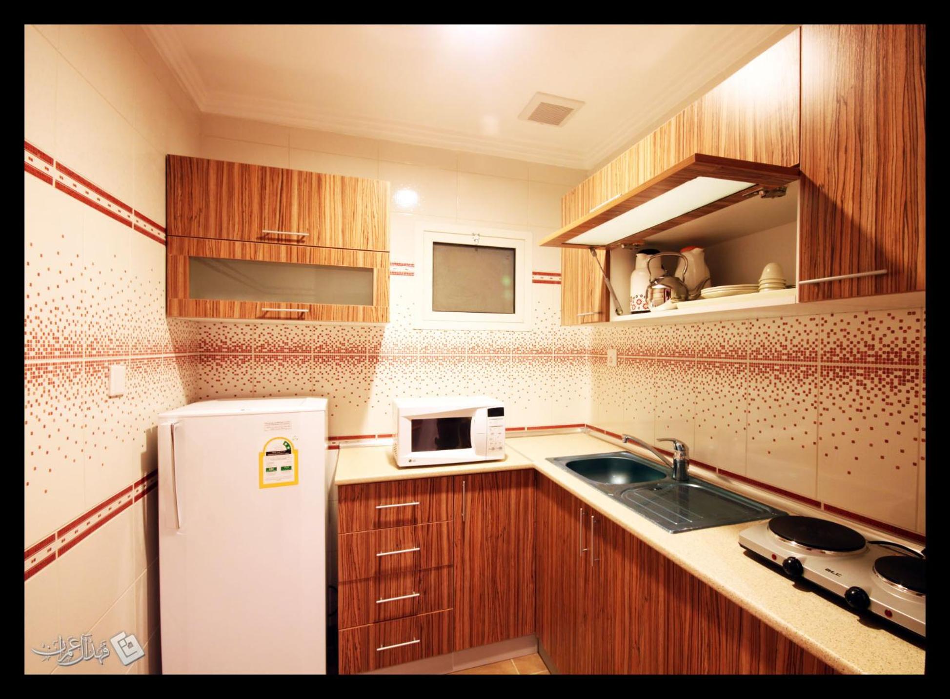 Three-Bedroom Apartment photo 2