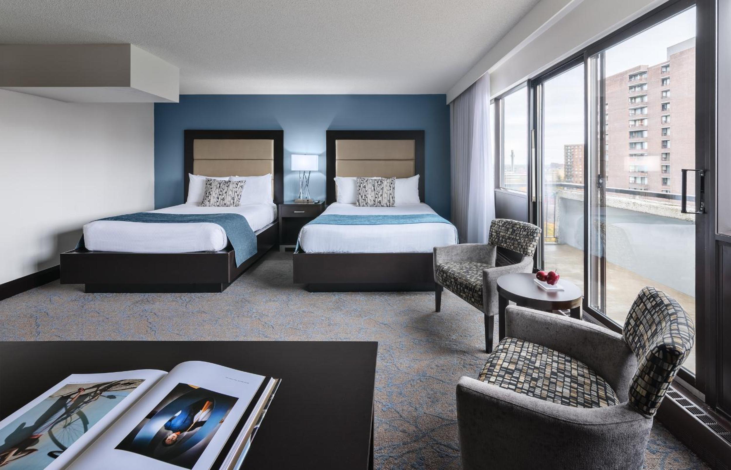 Bachelor Suite with Two Queen Beds - Photo 1