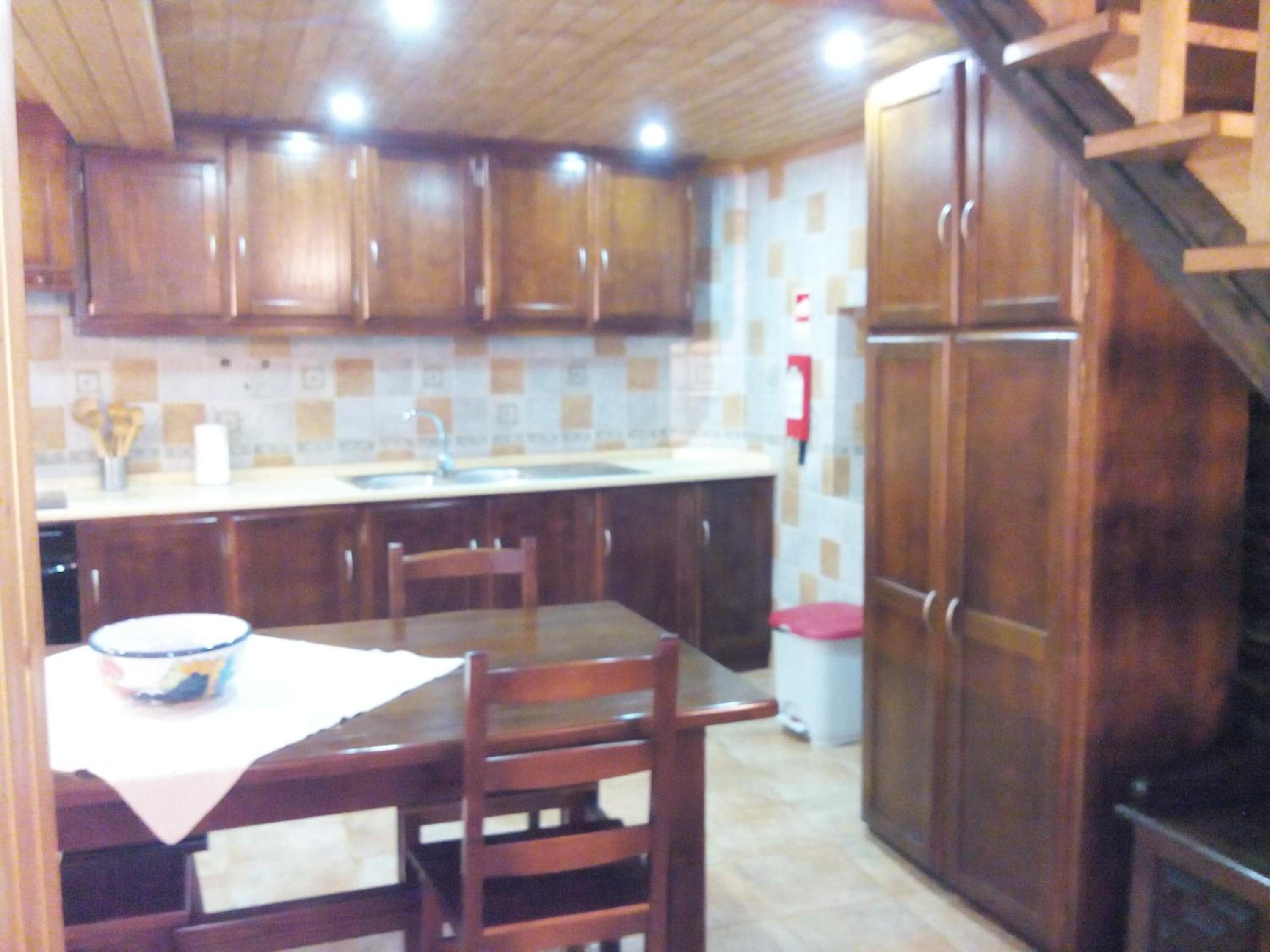 Three-Bedroom House - Photo 34