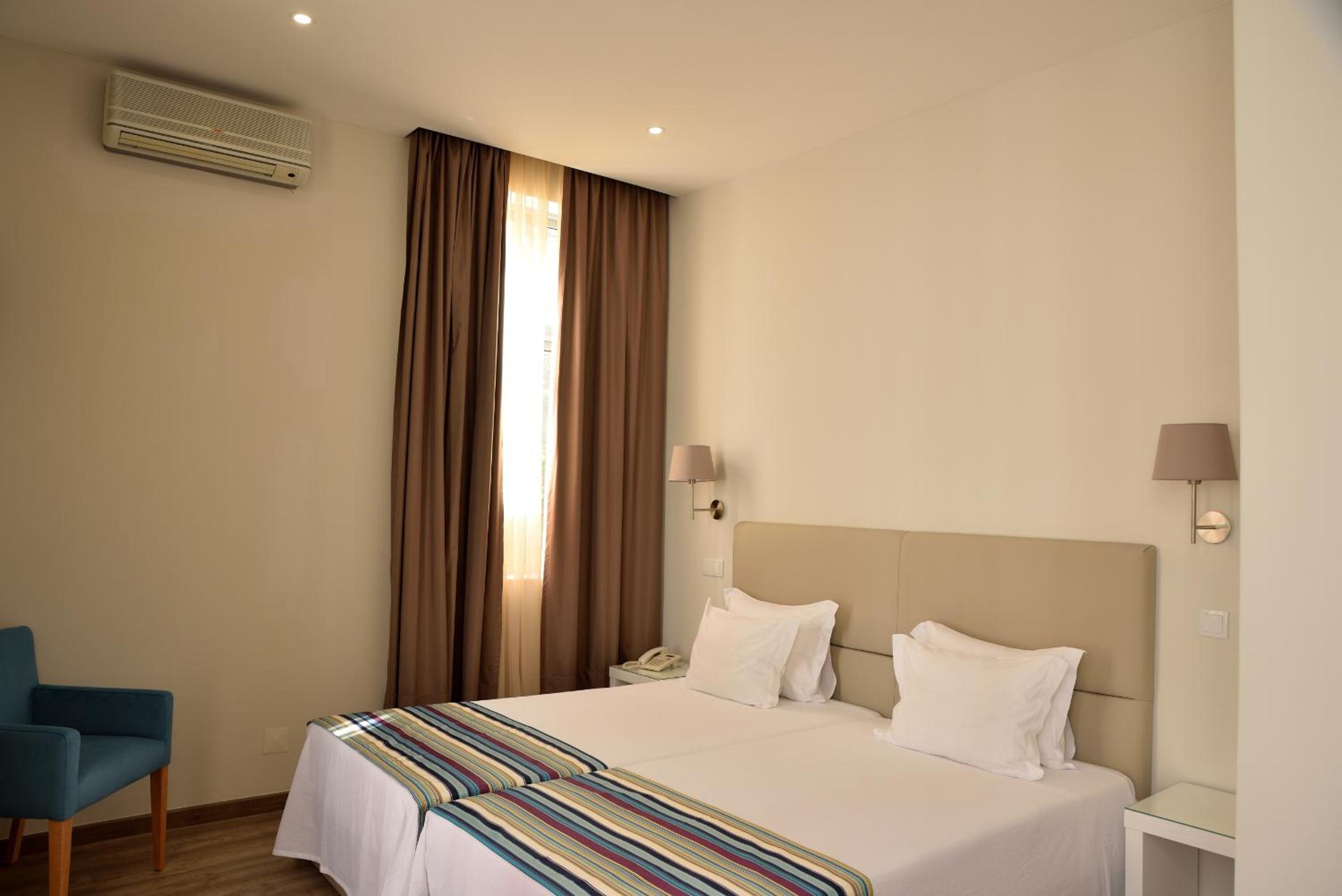 Twin Room - Photo 1