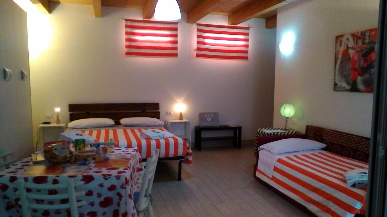 Quadruple Room with Balcony - Photo 1