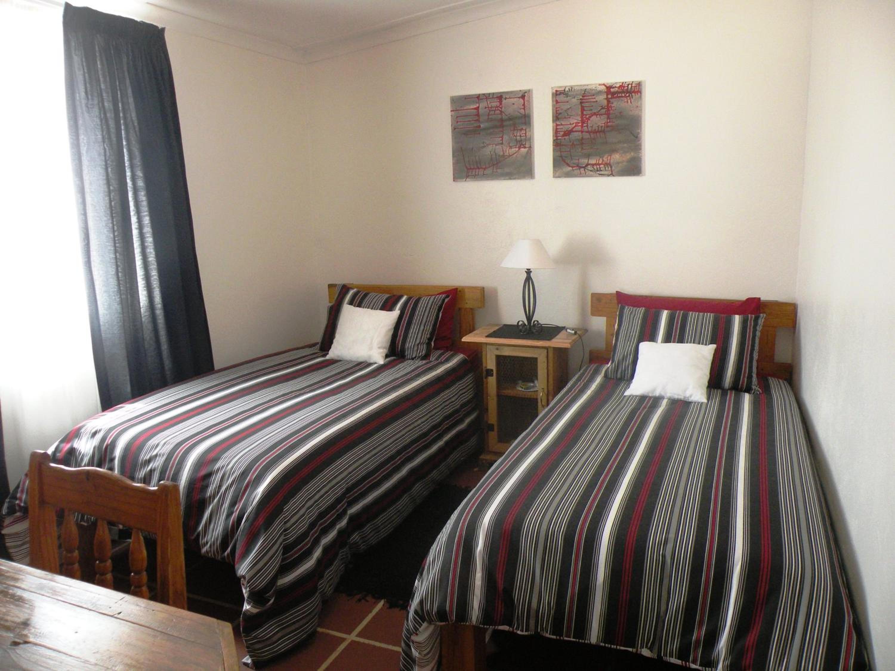 Three-Bedroom House - Photo 18