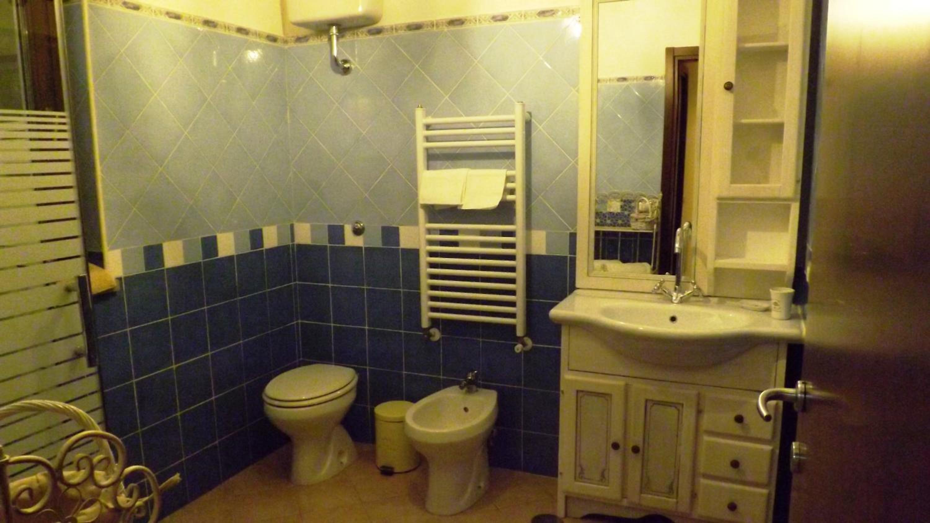 Three-Bedroom House - Photo 14