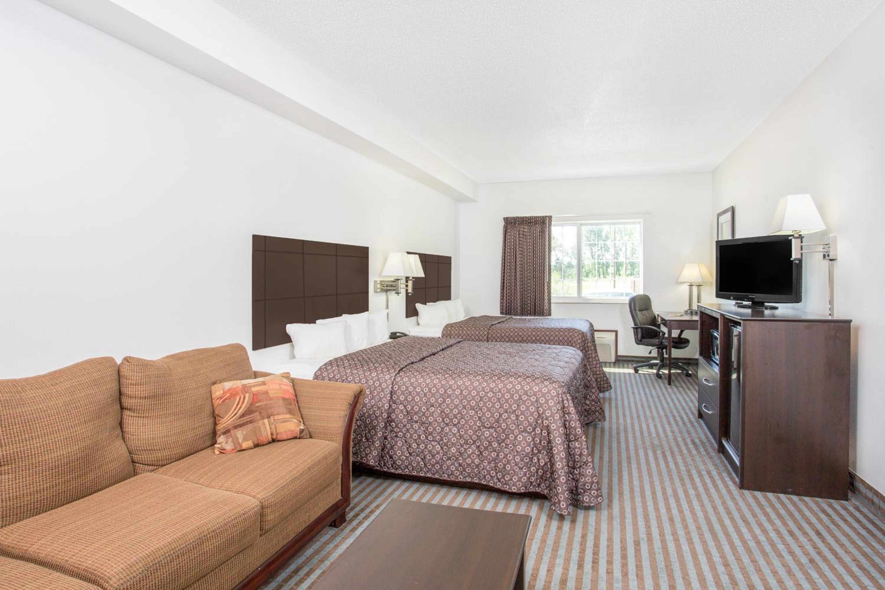 Deluxe Queen Suite with Two Queen Beds - Non-Smoking - Photo 1