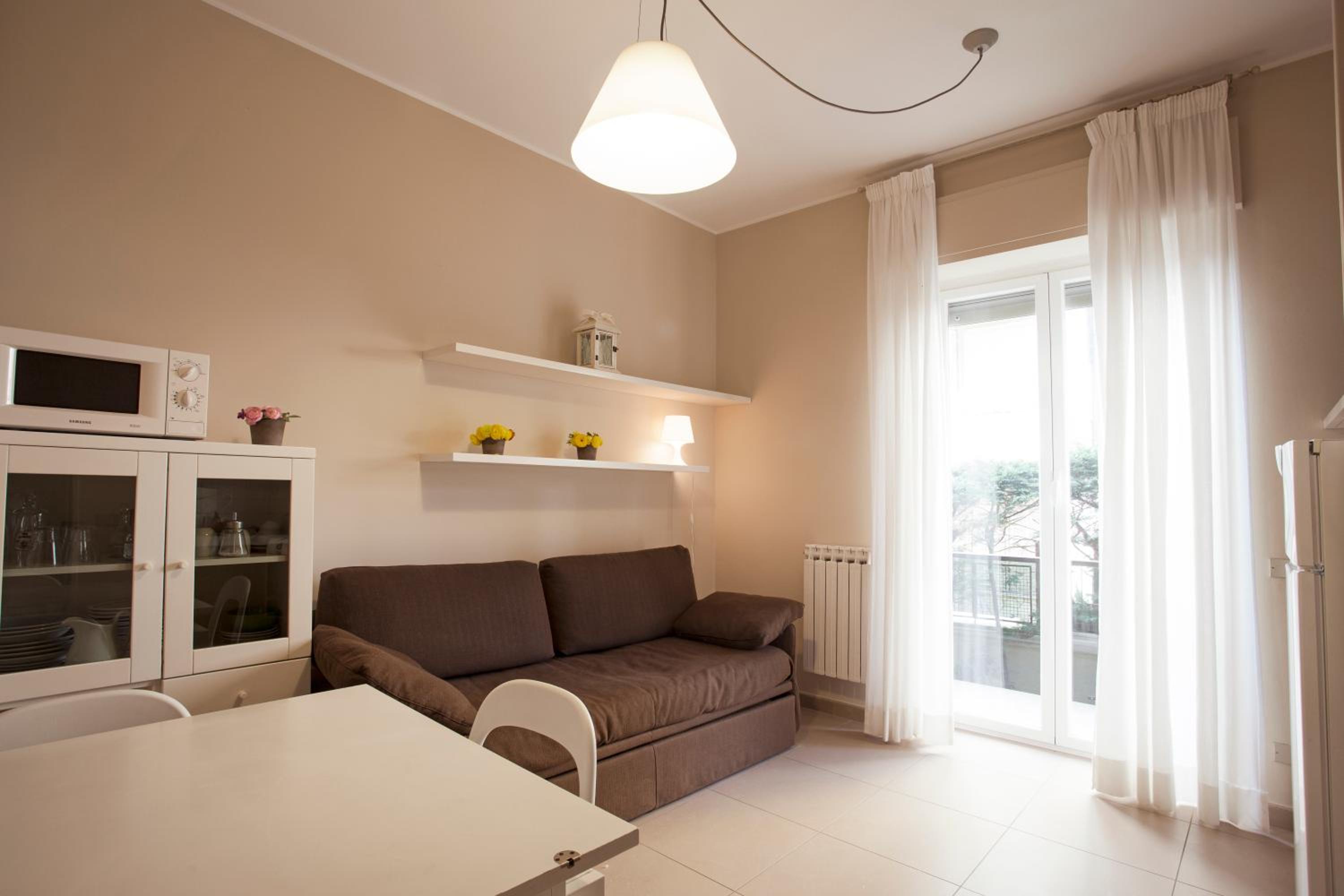 One-Bedroom Apartment with Side Sea View