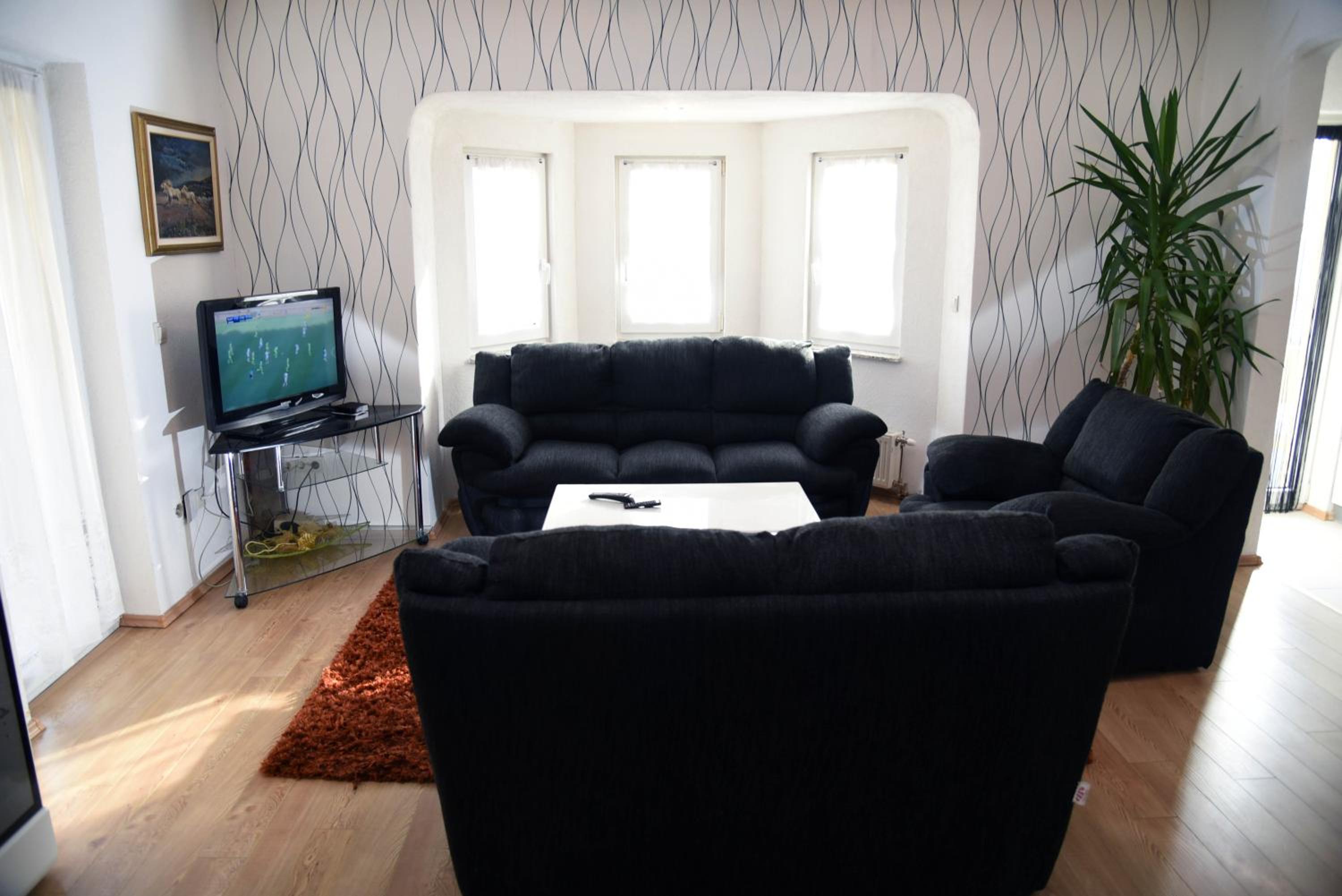 Three-Bedroom Apartment photo 2