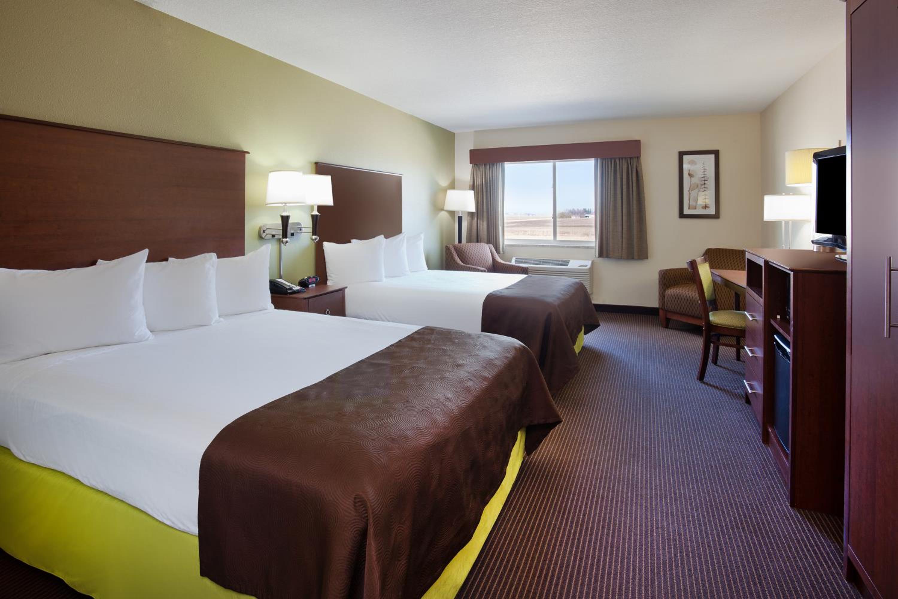 Deluxe Queen Room with Two Queen Beds - Non-Smoking photo 1