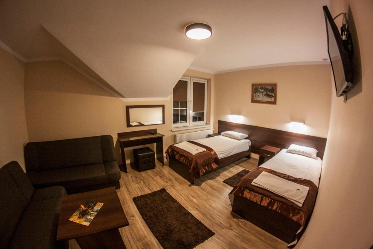 Quadruple Room with Private Bathroom - Photo 1