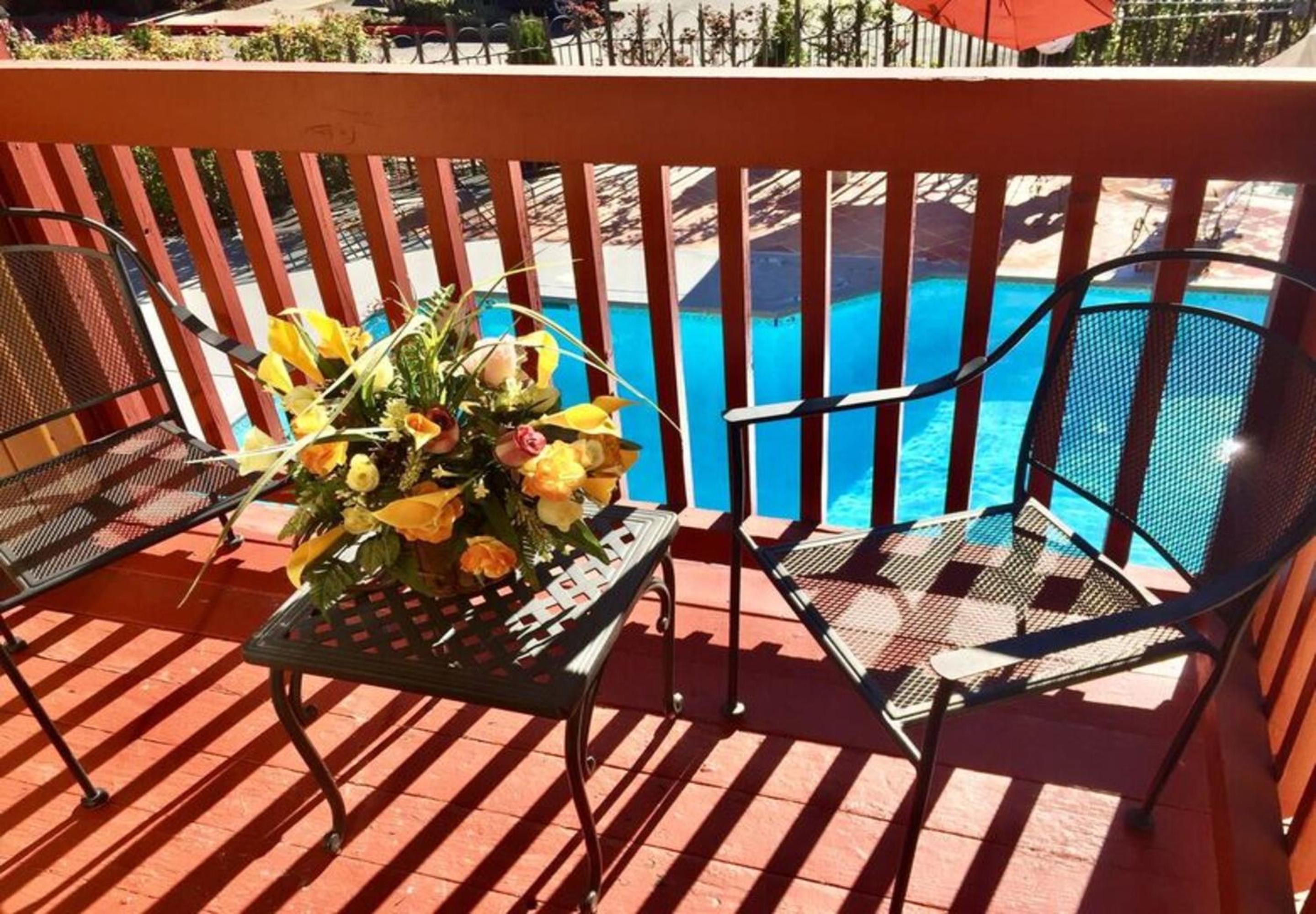 Queen Room with Two Queen Beds - Pool View - Photo 5
