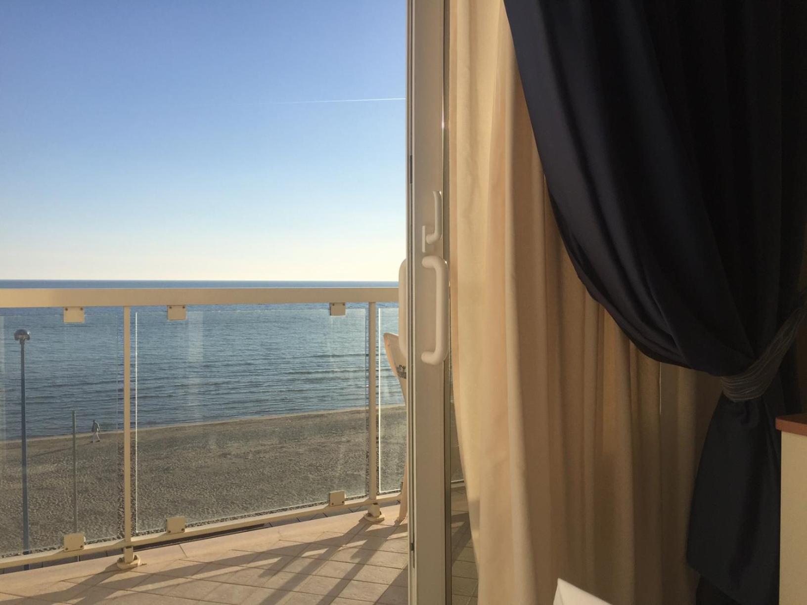 Quadruple Room with Balcony photo 3