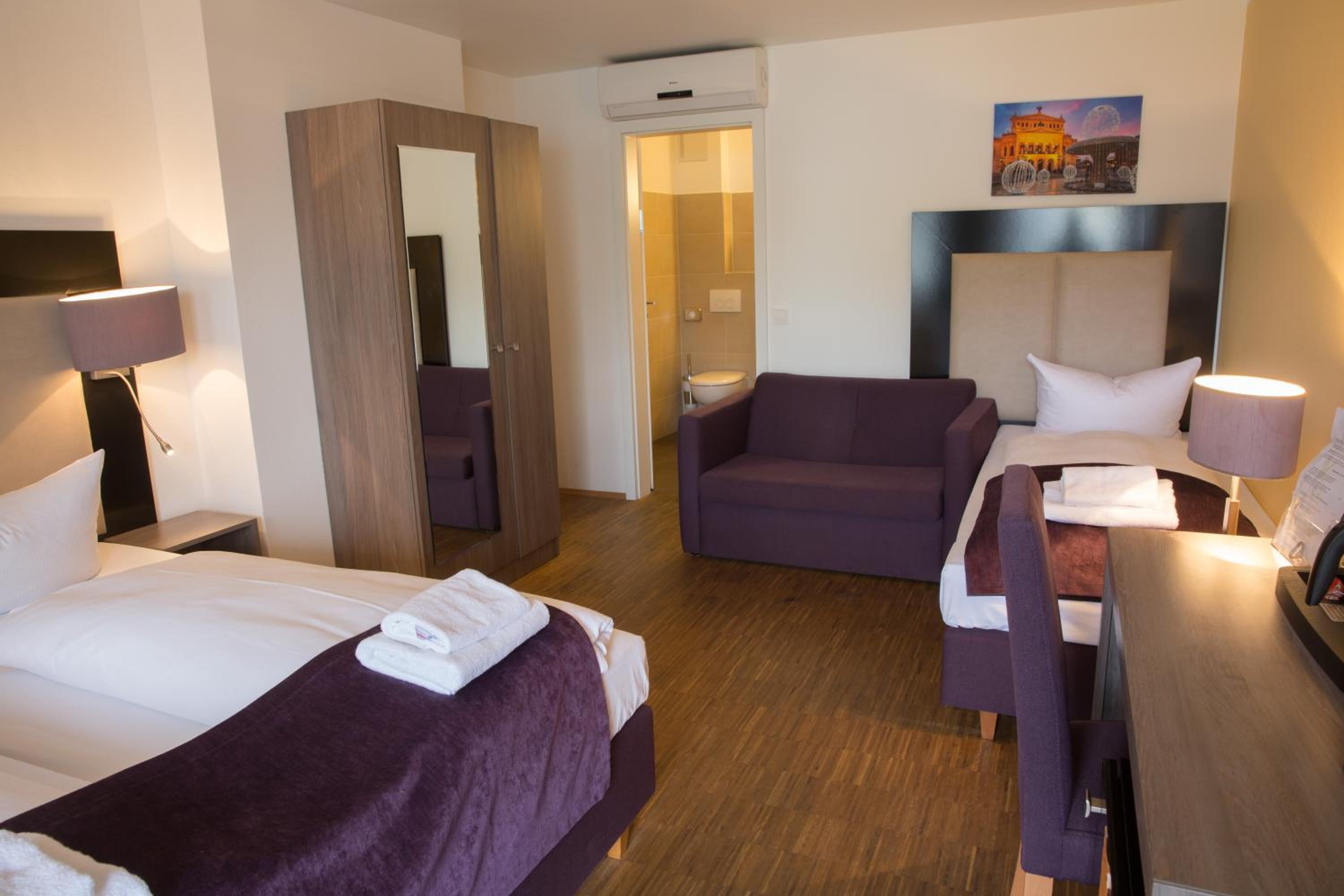 Triple Room - Photo 1