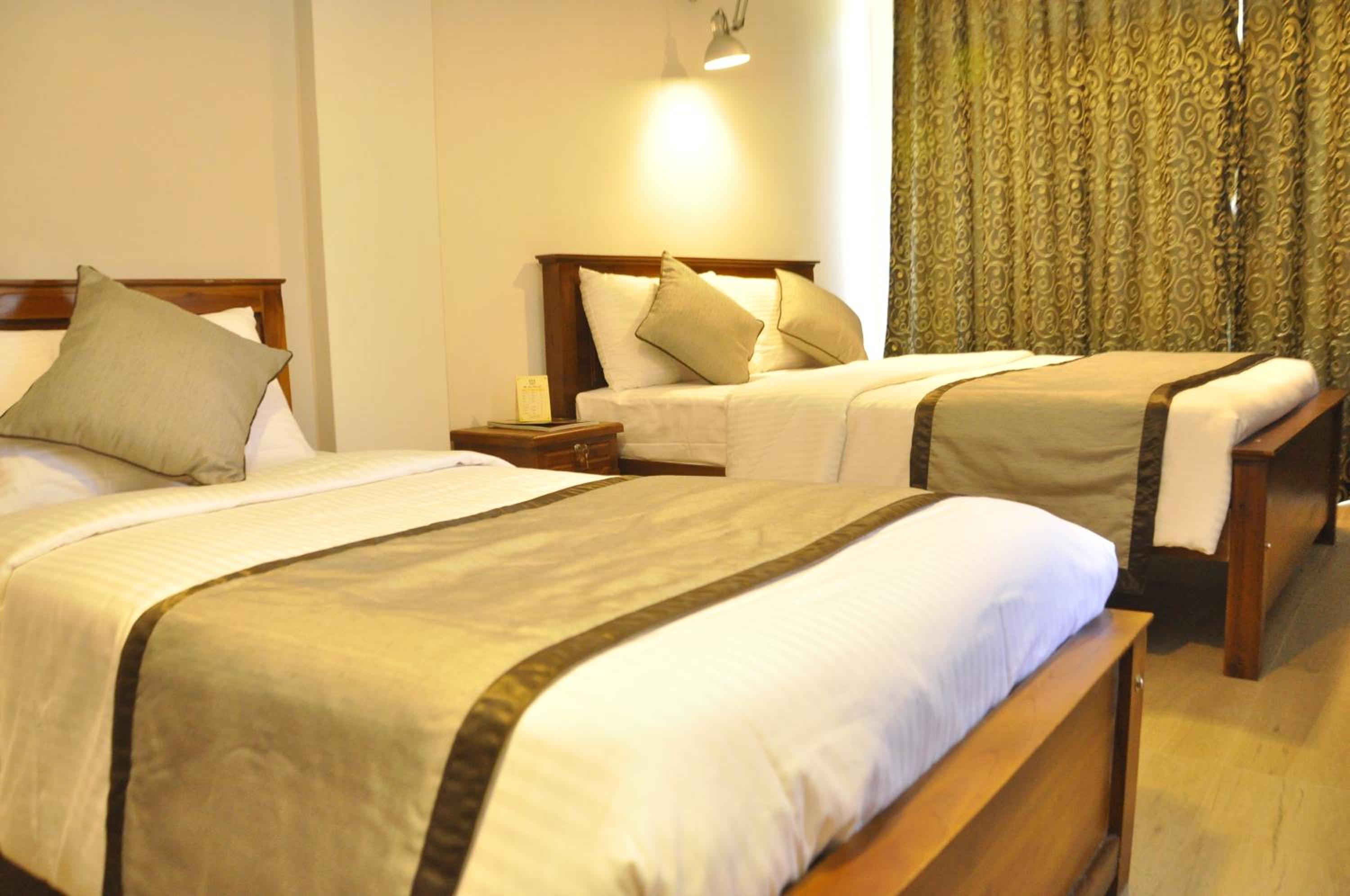 Deluxe Triple Room - Photo 10