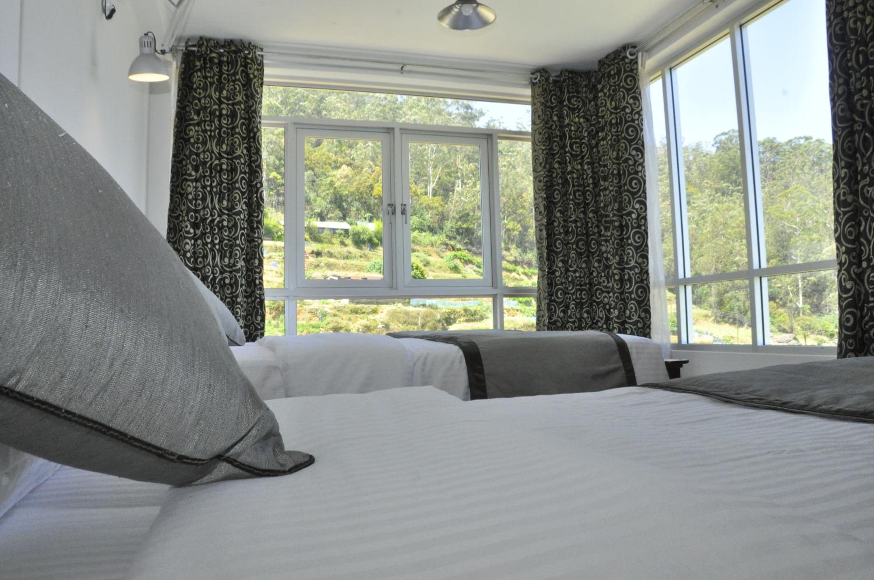 Deluxe Triple Room - Photo 11