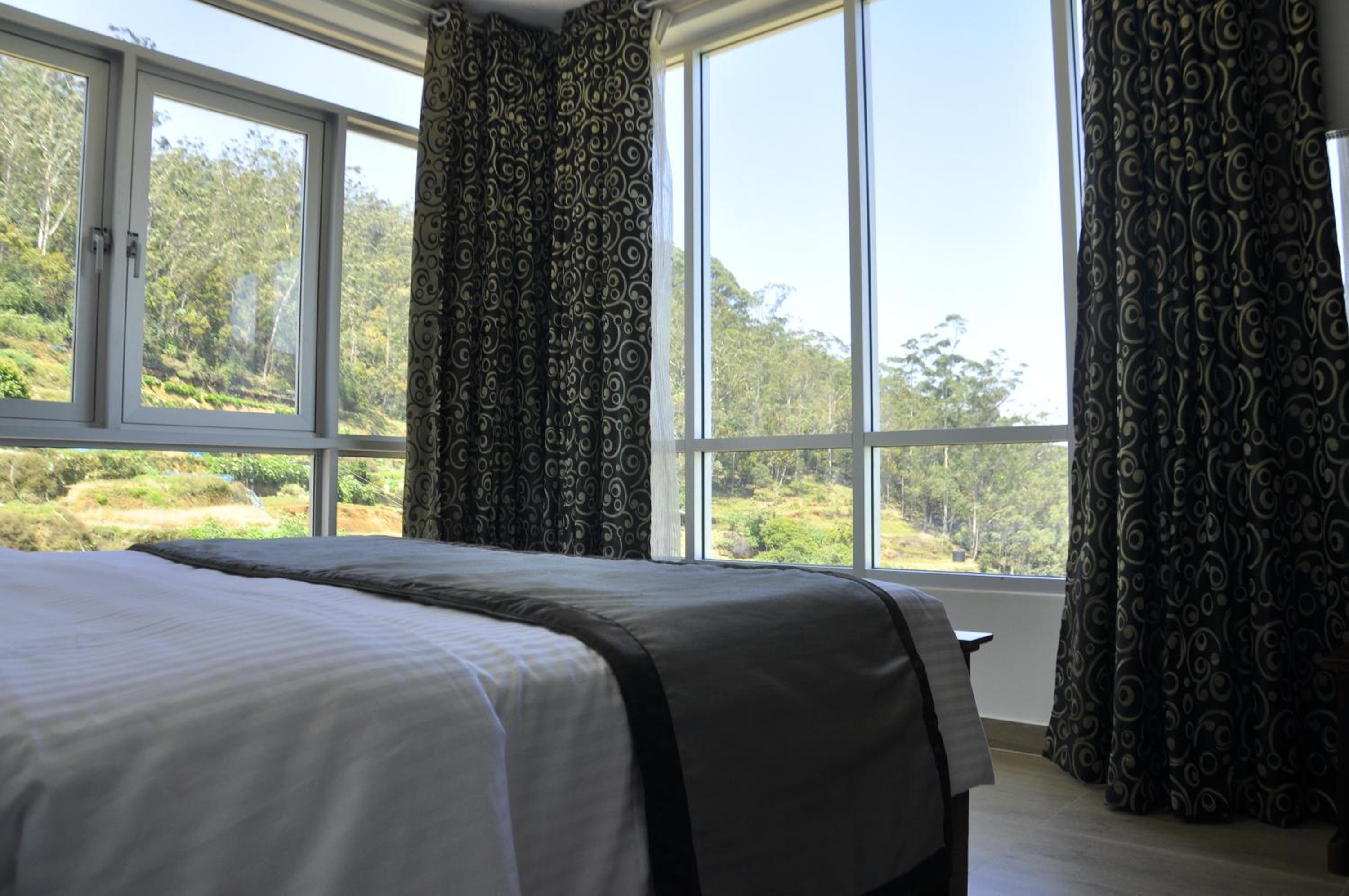 Deluxe Triple Room - Photo 1