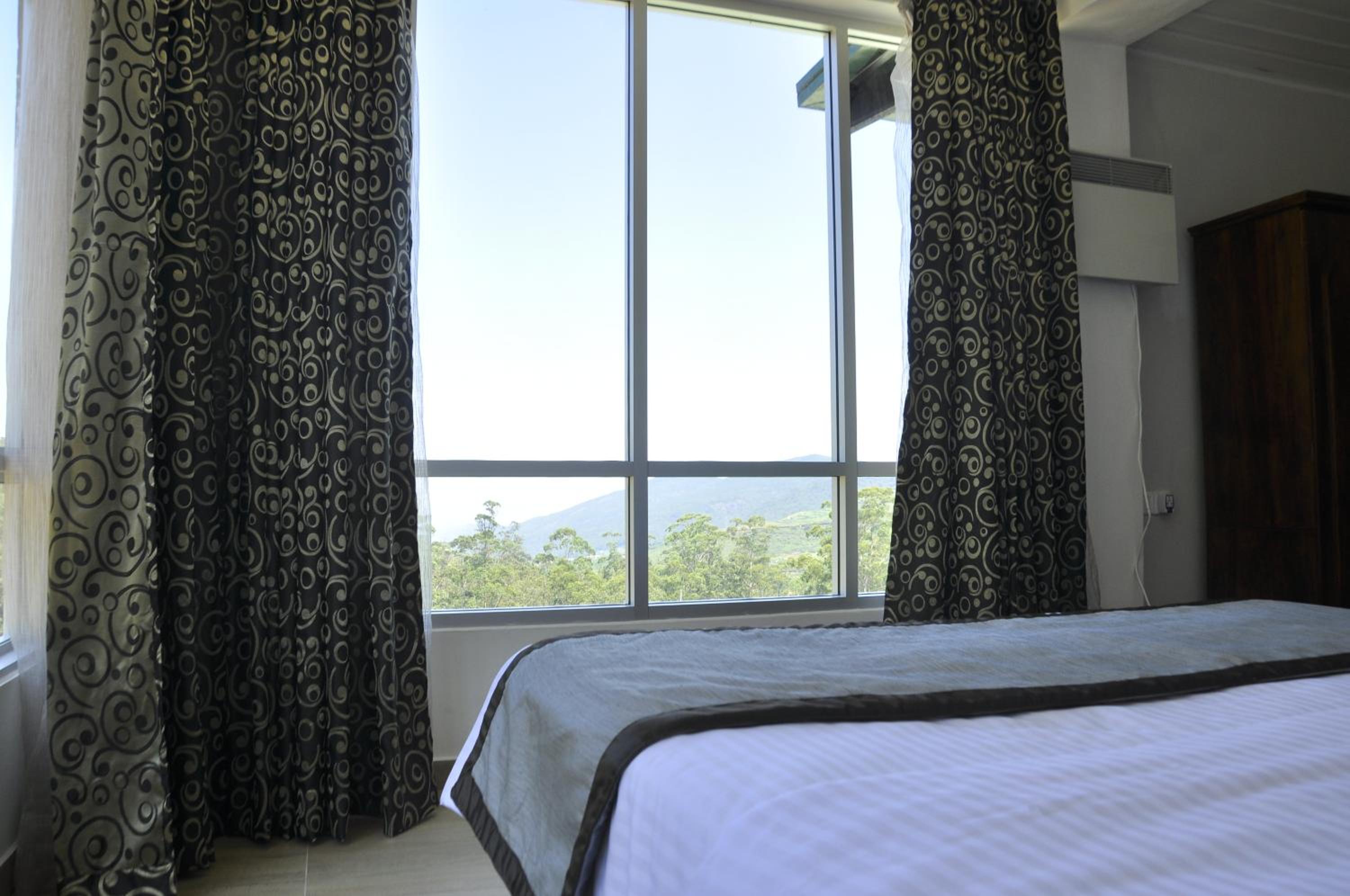 Deluxe Triple Room - Photo 13