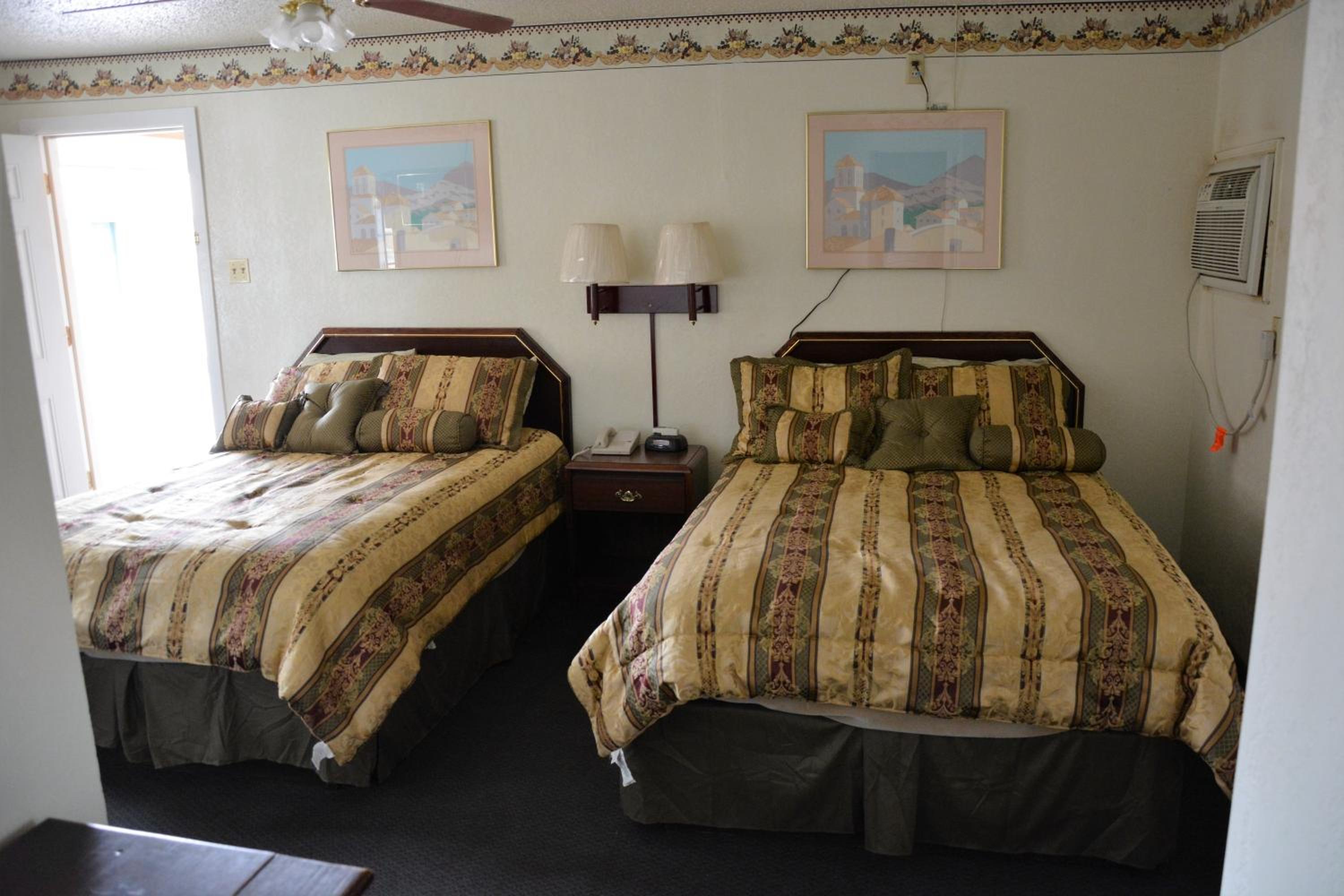 Standard Room with Two Full Beds - Photo 1