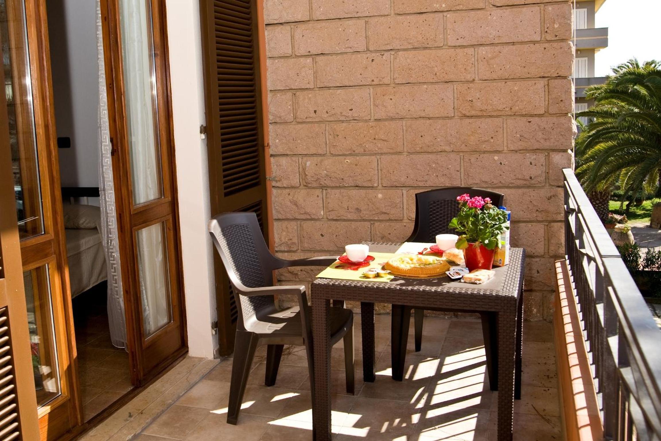 Quadruple Room with Balcony photo 3