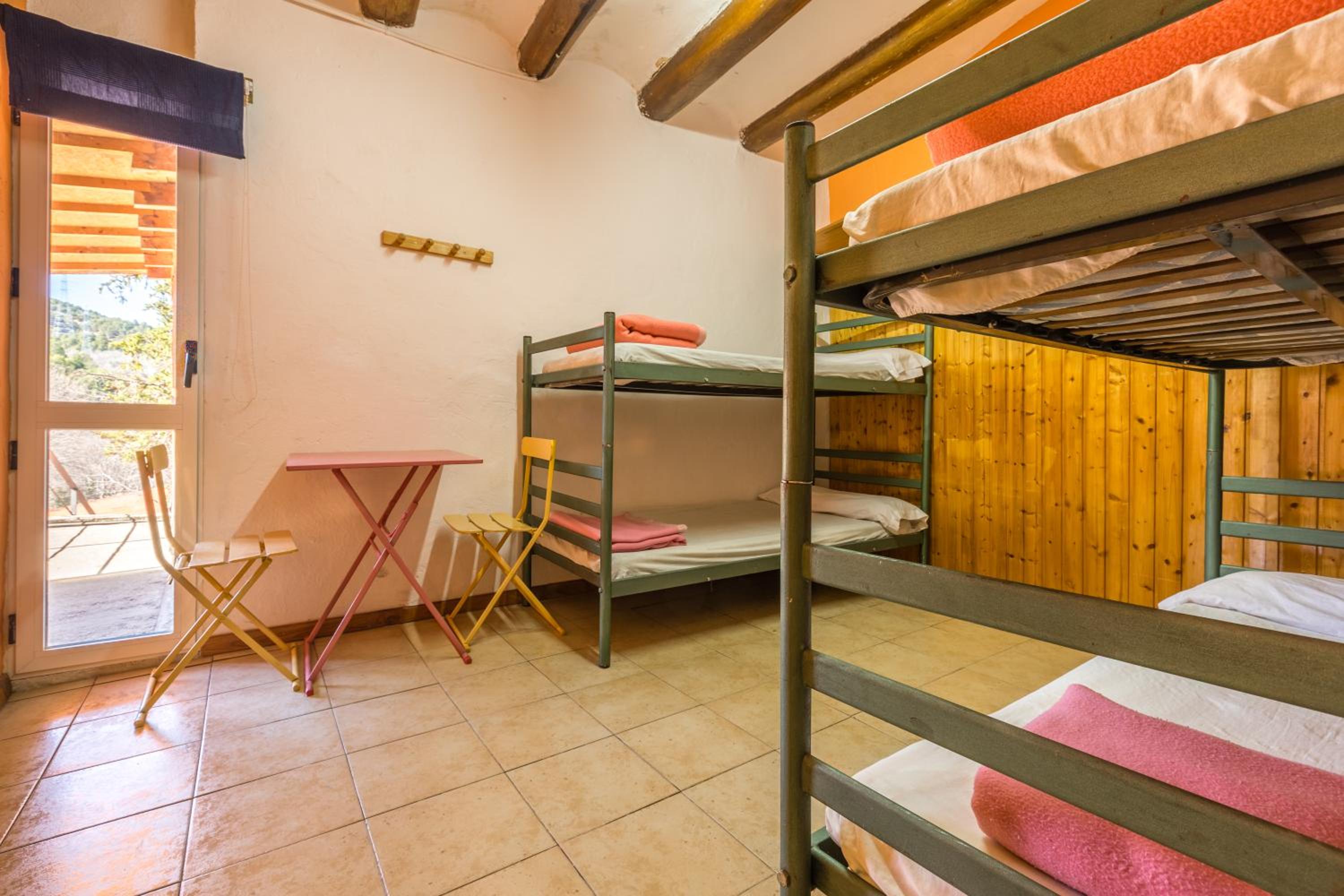 Habitación Cuádruple con Vista al Jardín