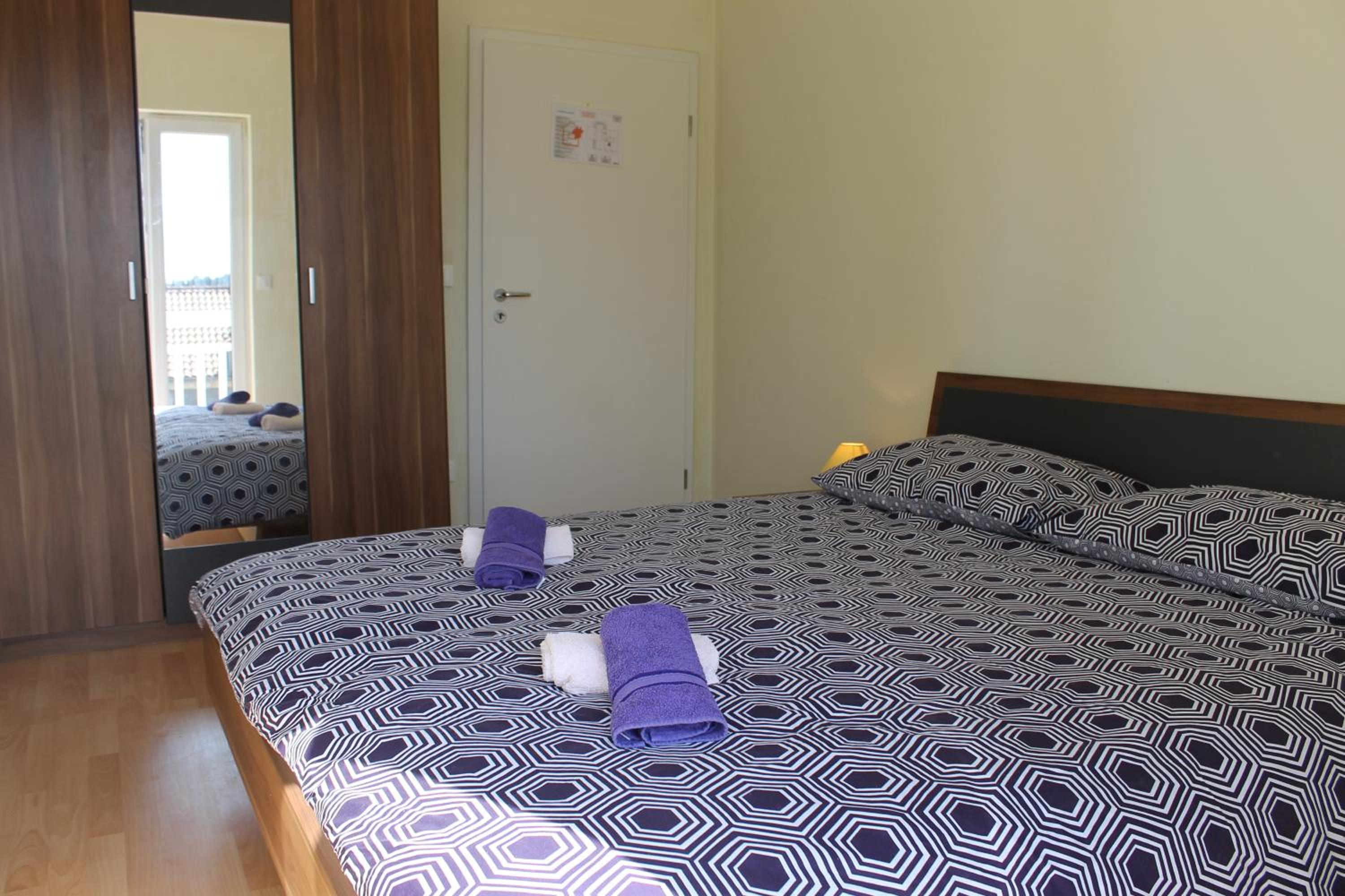 Three-Bedroom Apartment - Photo 11