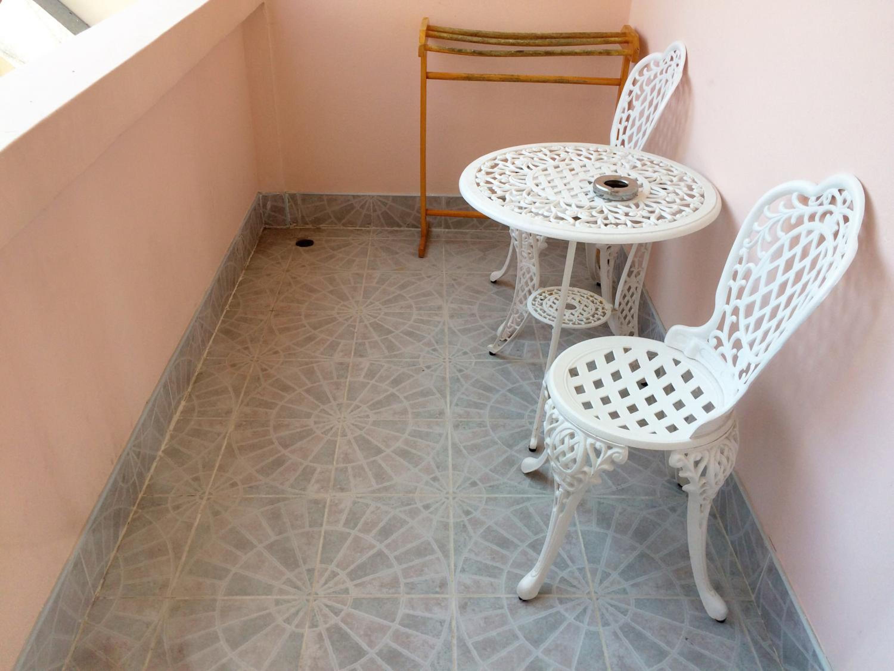 Quadruple Room with Balcony - Photo 11