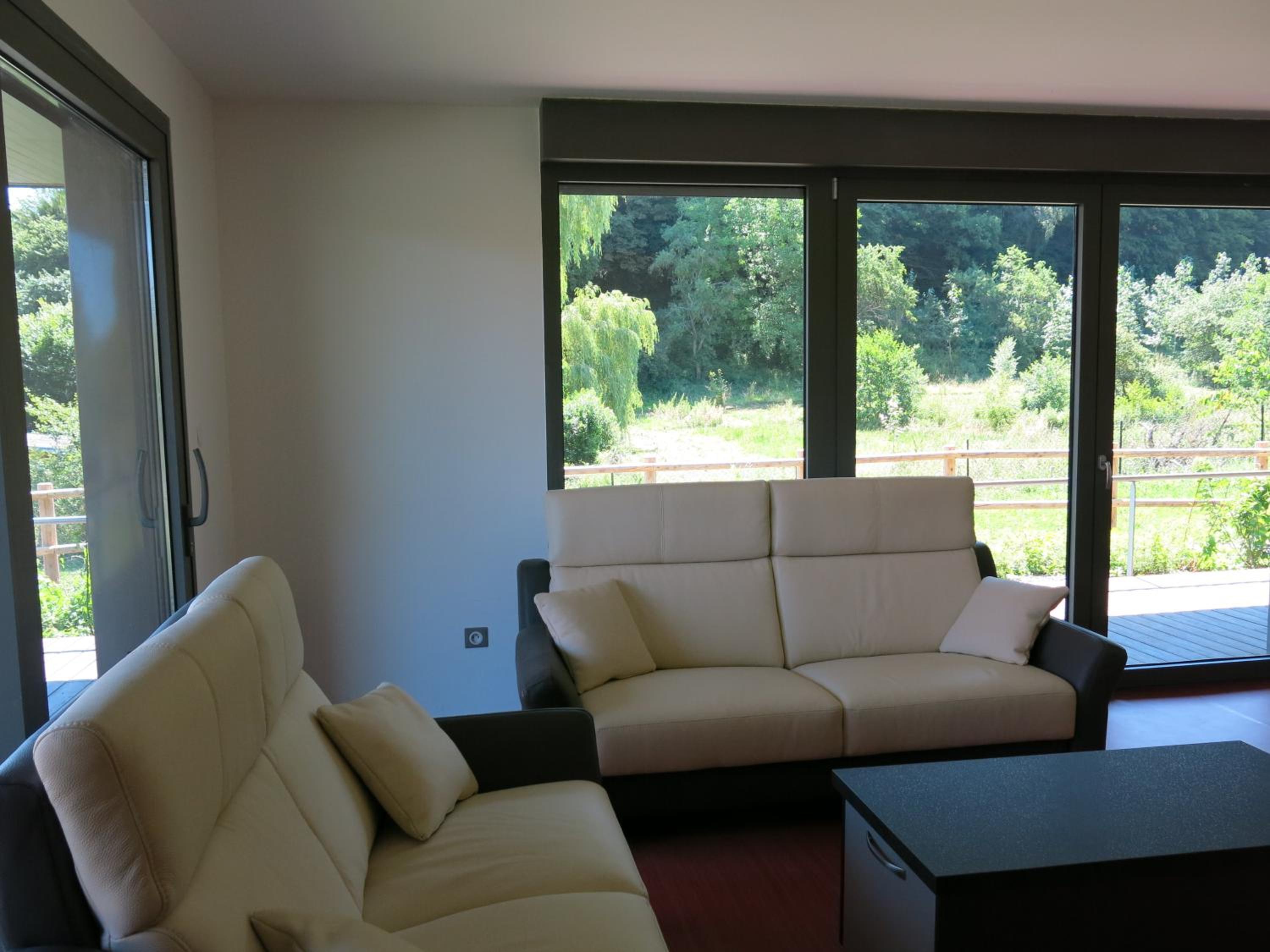 Three-Bedroom House - Photo 2