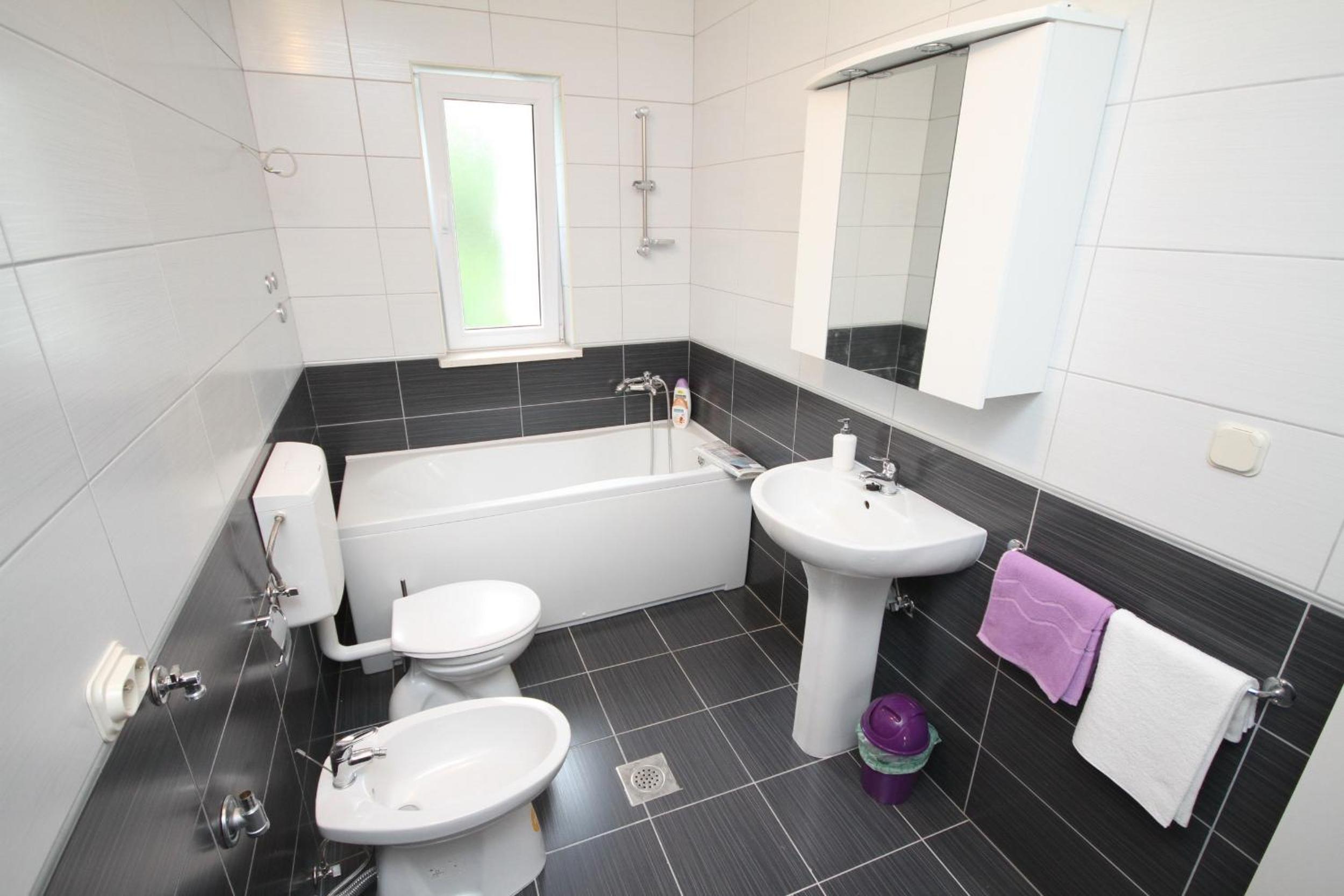 Three-Bedroom Apartment - Photo 8