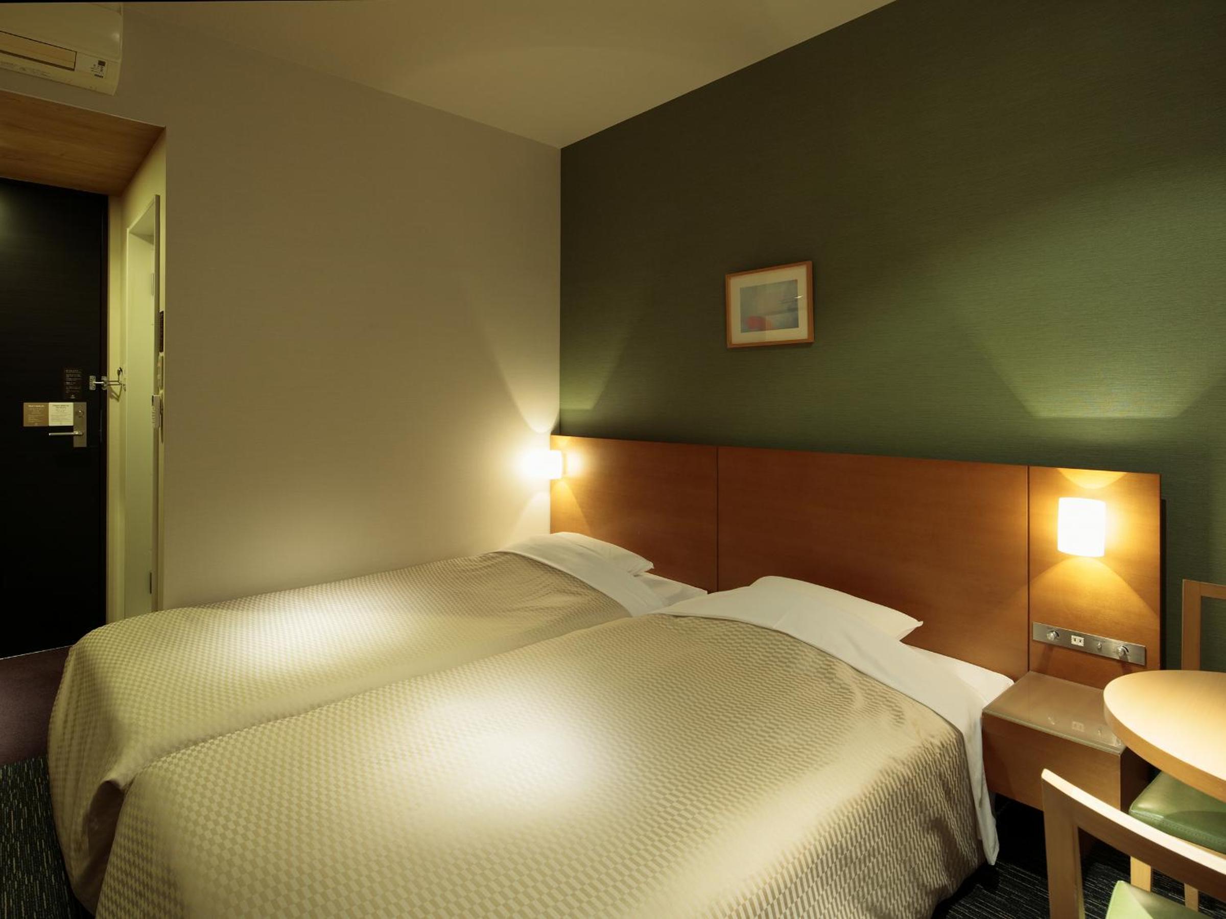Twin Room - Non-Smoking - Photo 2