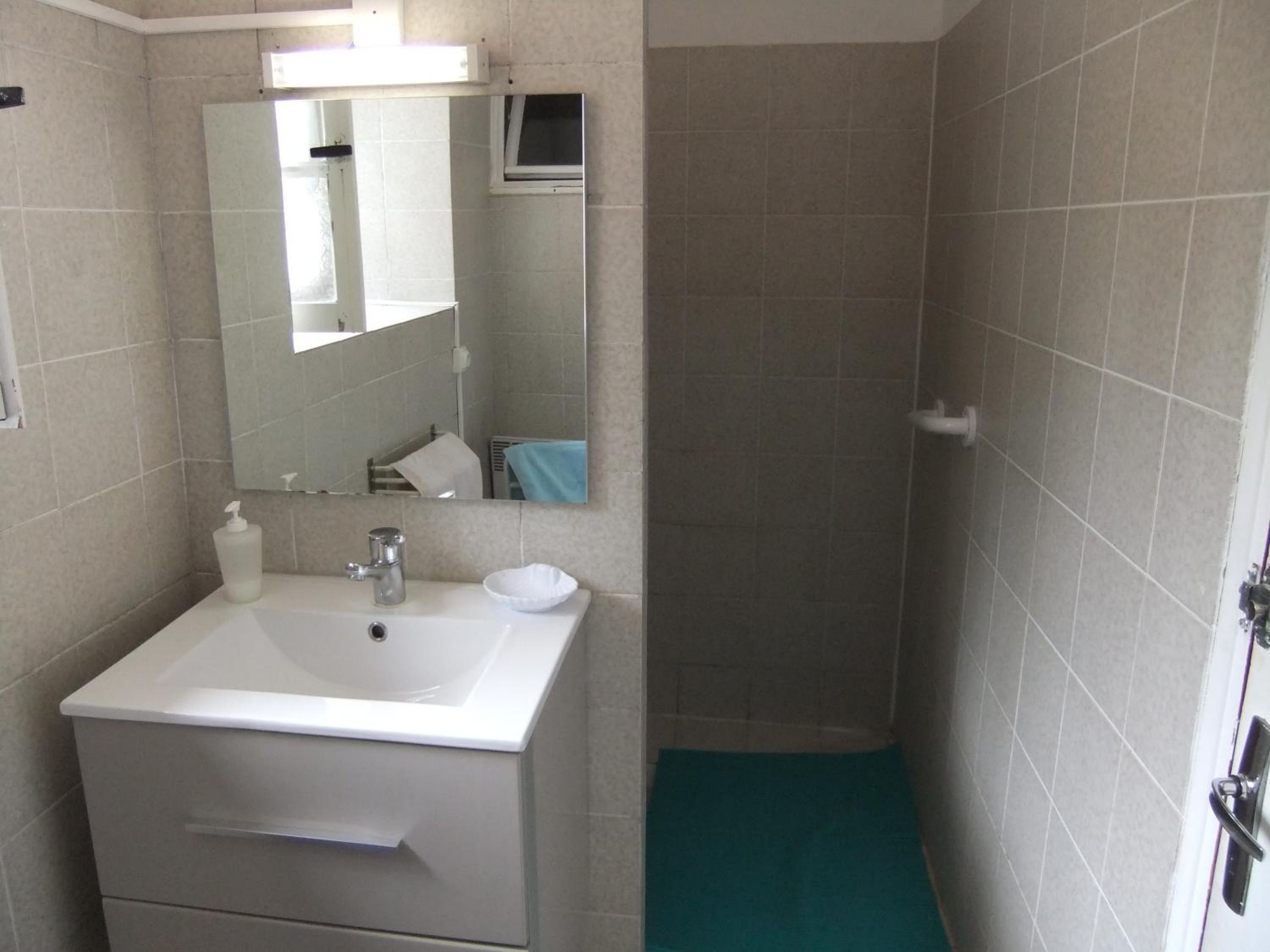 Four-Bedroom House - Photo 23