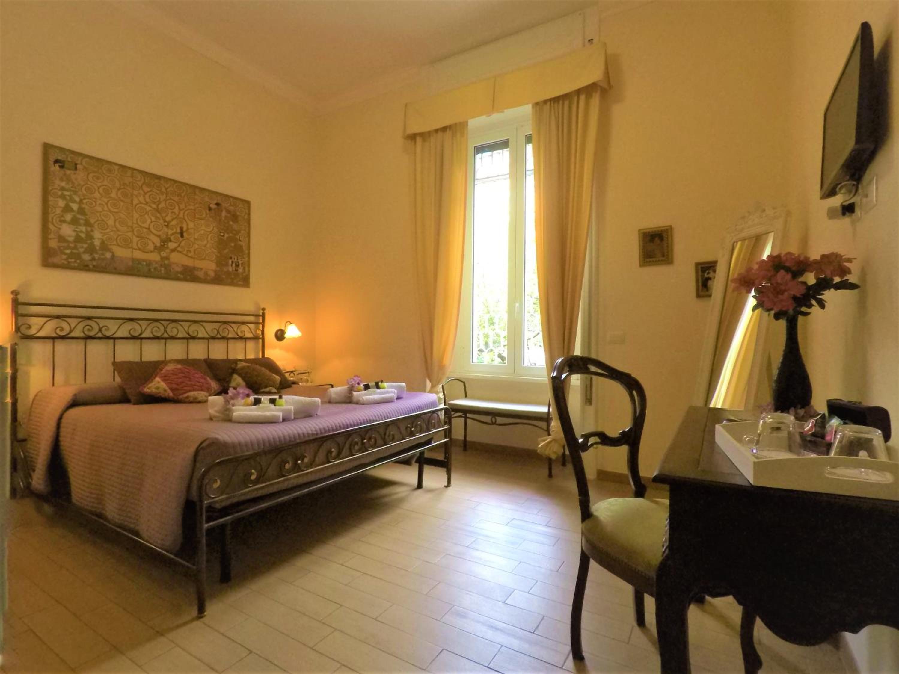 Quadruple Room with Private Bathroom