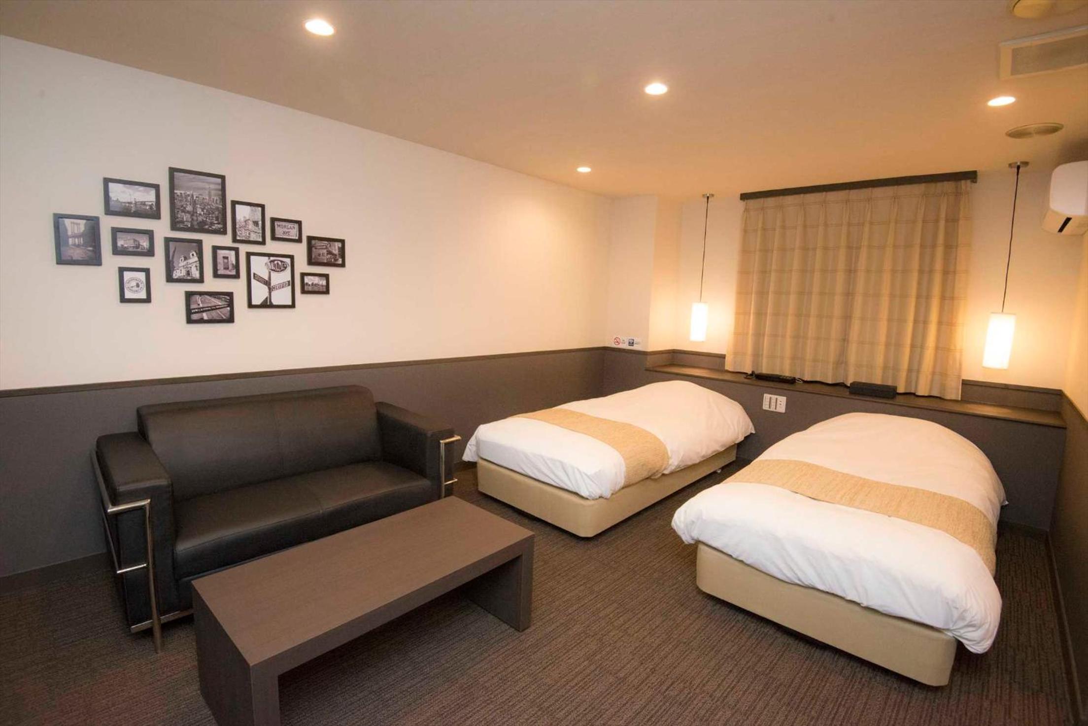 Twin Room - Photo 1