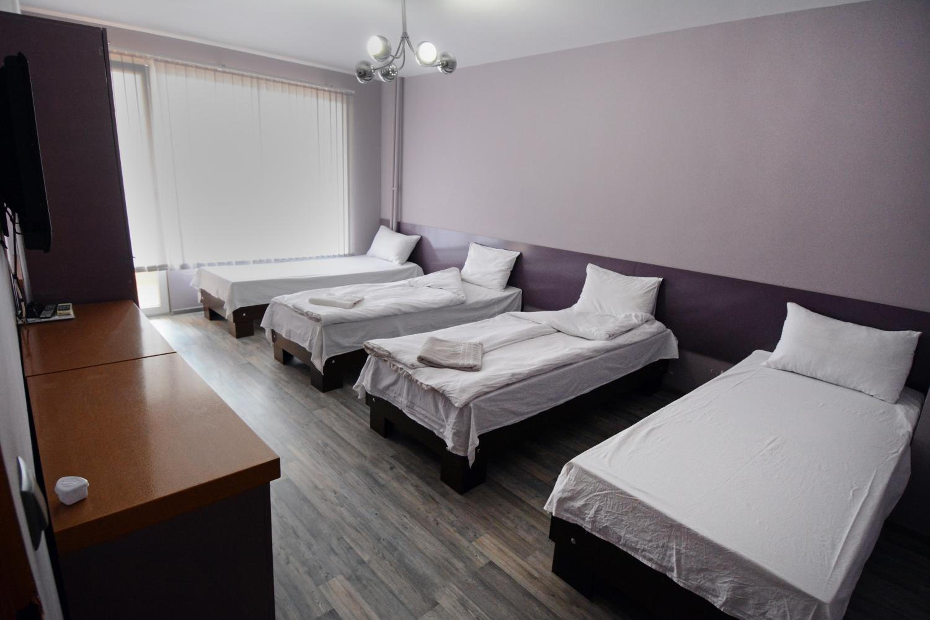 Three-Bedroom Apartment - Photo 2
