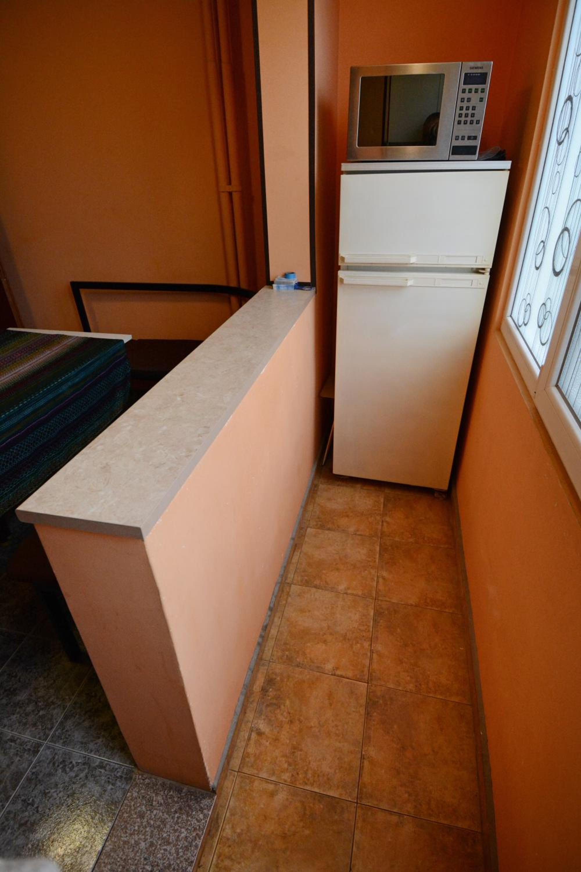Three-Bedroom Apartment - Photo 11