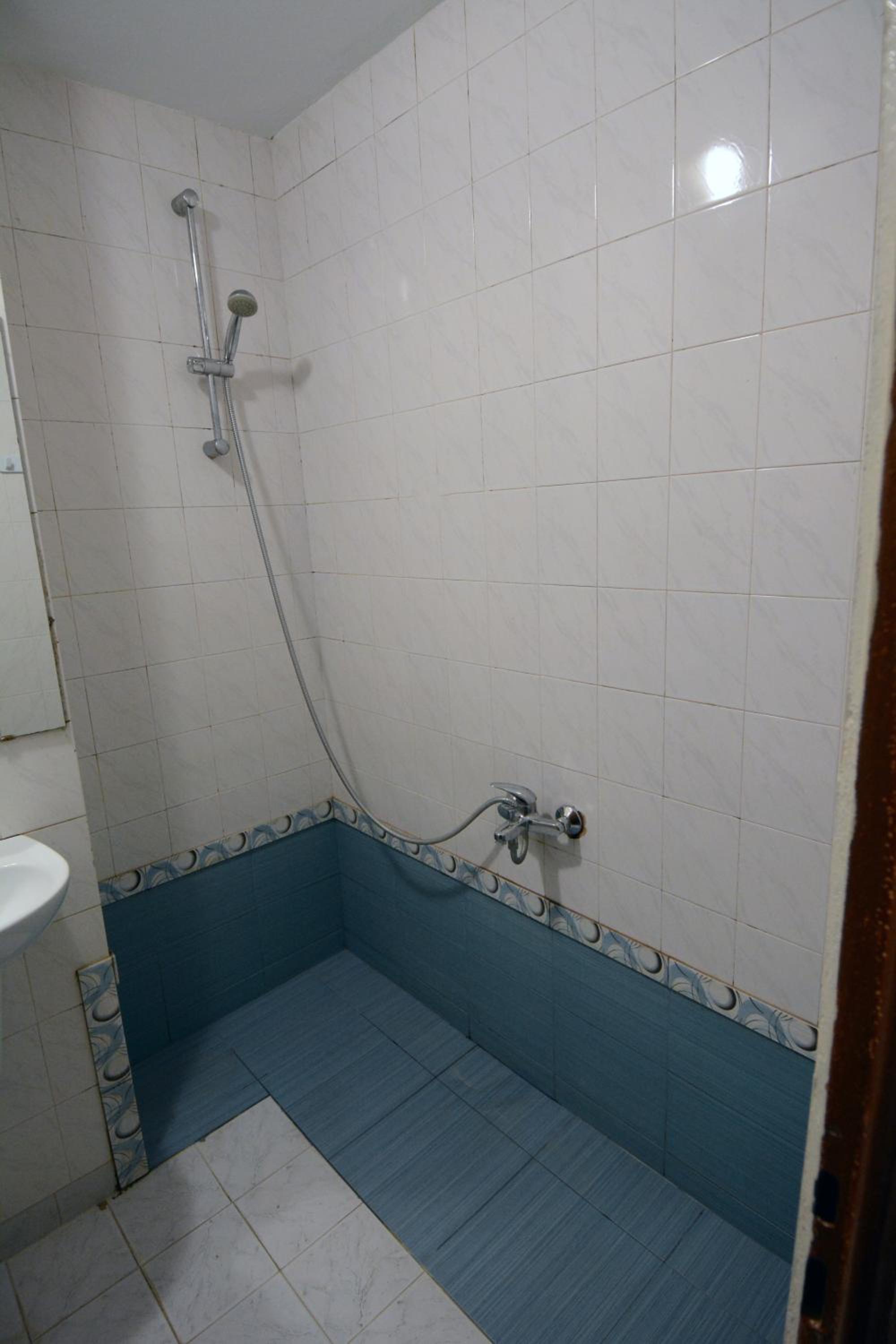 Three-Bedroom Apartment - Photo 13