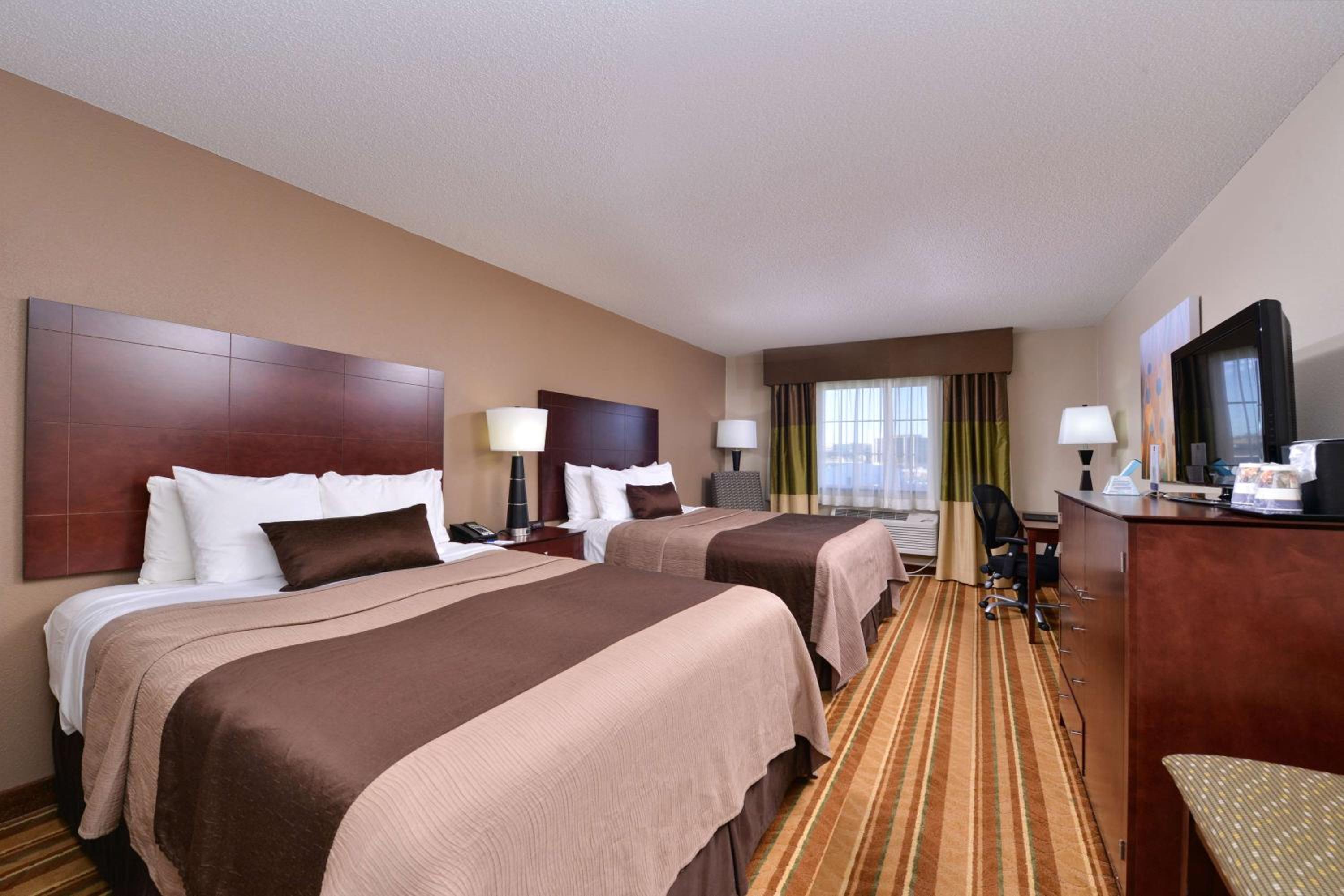 Queen Room With Two Queen Beds - Pet-Friendly/Non-Smoking - Photo 1