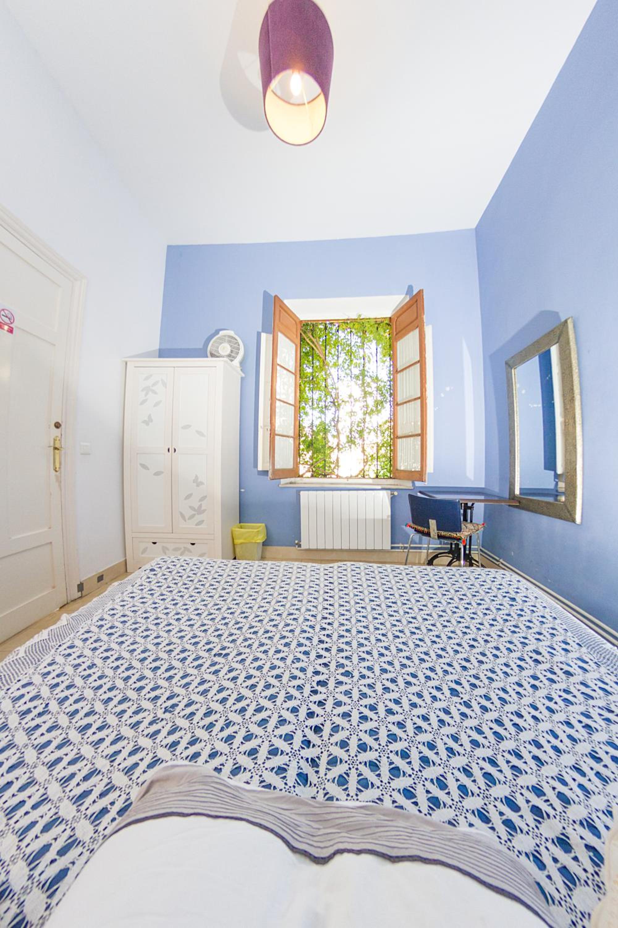 Habitación doble con baño compartido