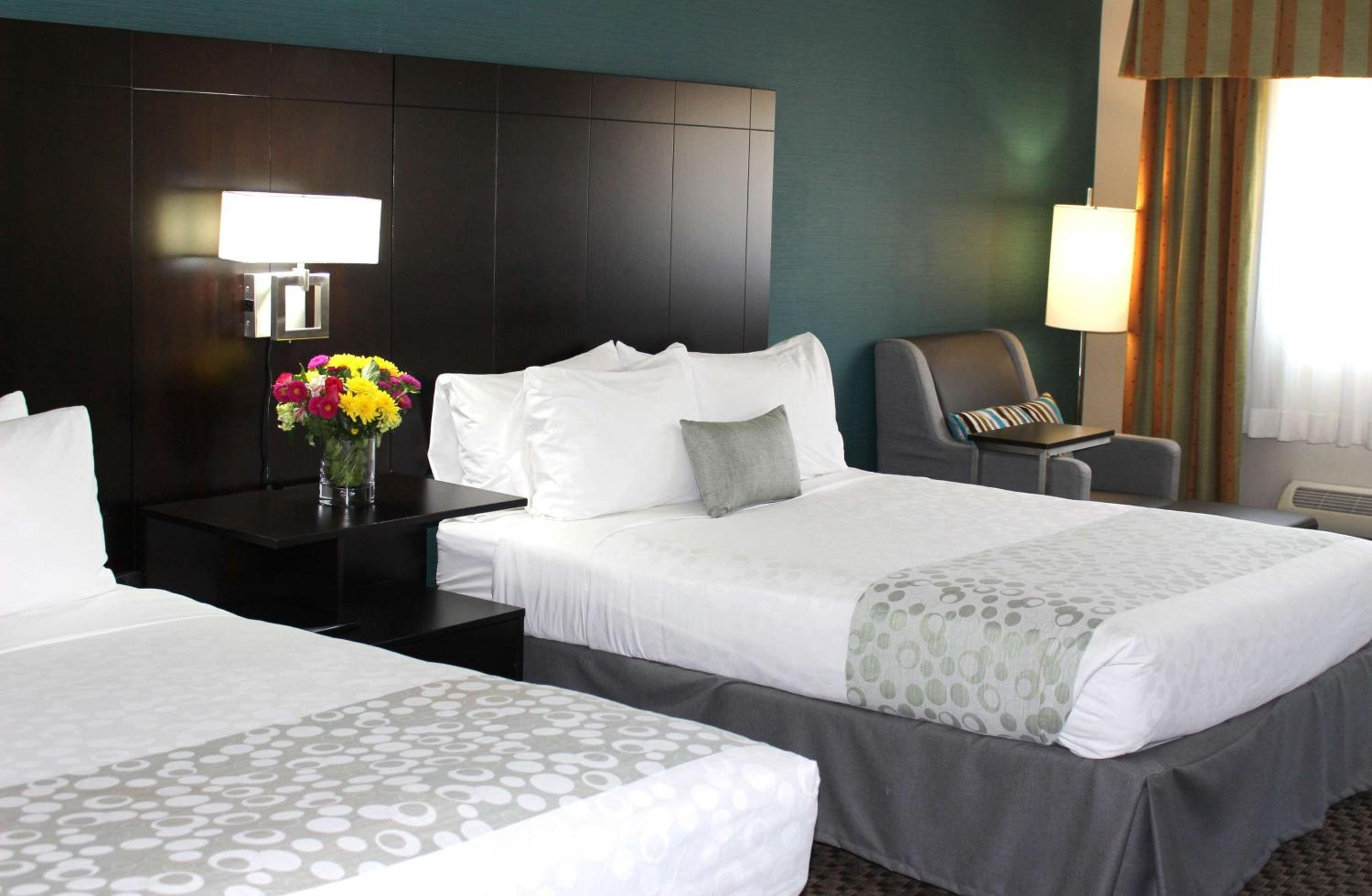 Queen Room with Two Queen Beds and Balcony - Photo 1