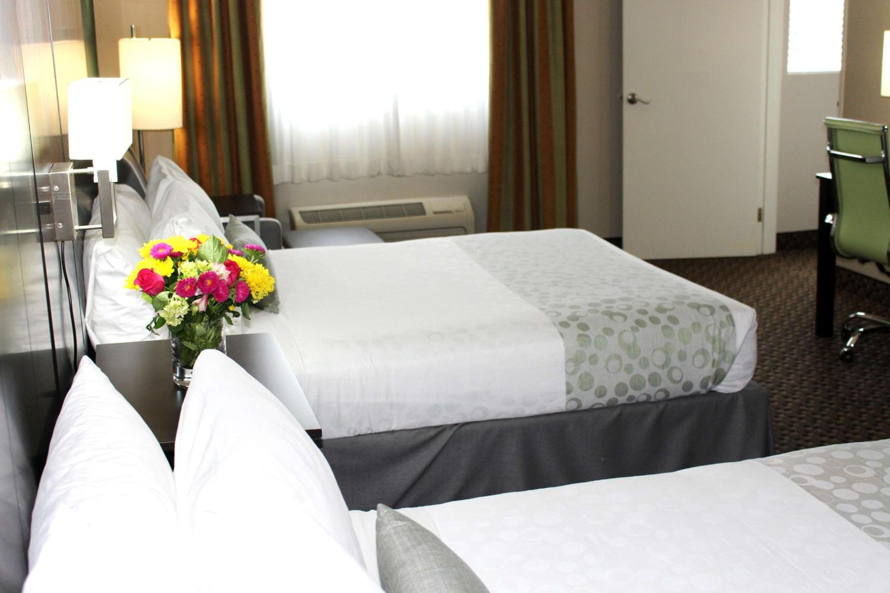 Queen Room with Two Queen Beds and Balcony - Photo 3