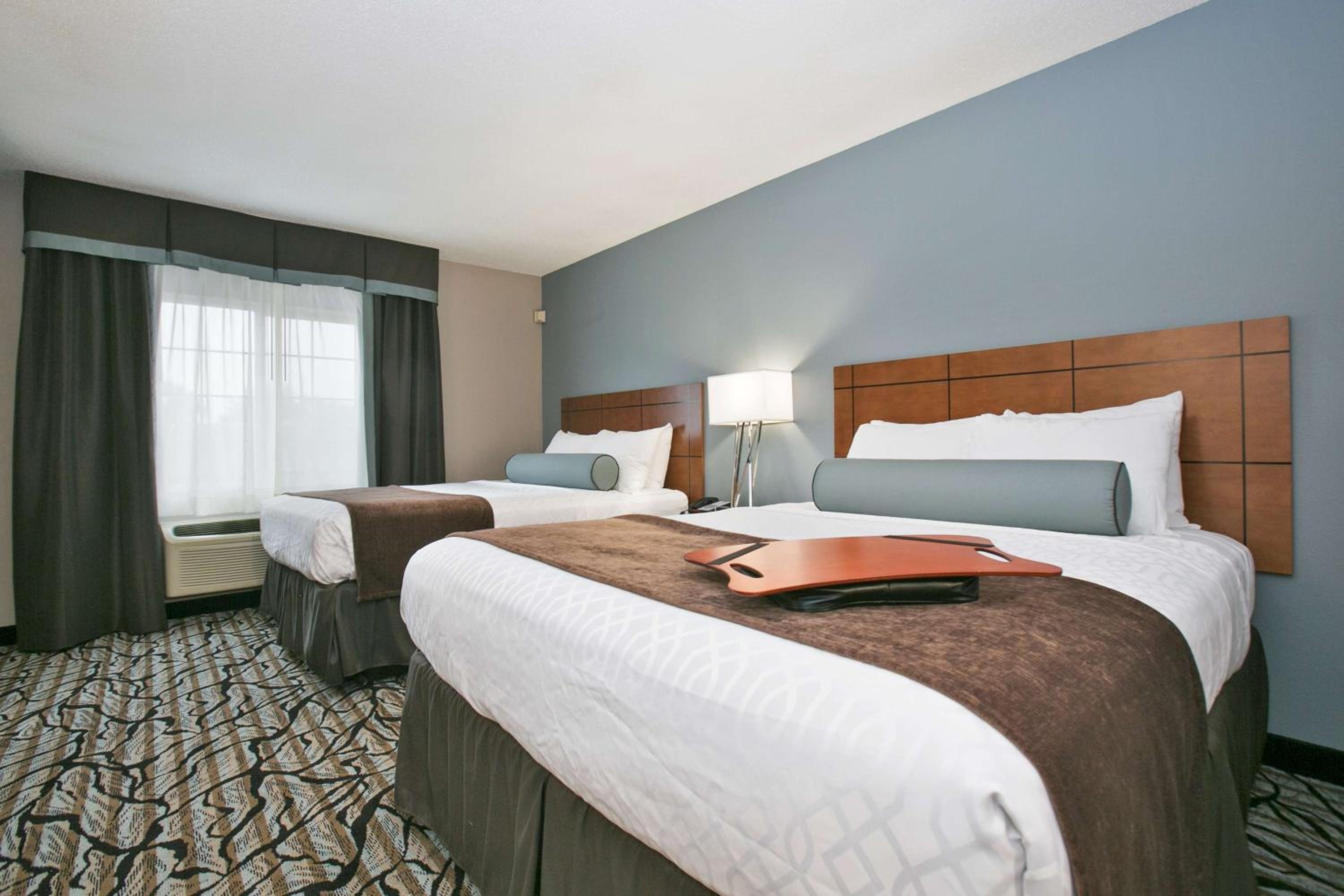 Queen Suite with Two Queen Beds and Sofa Bed - Photo 1