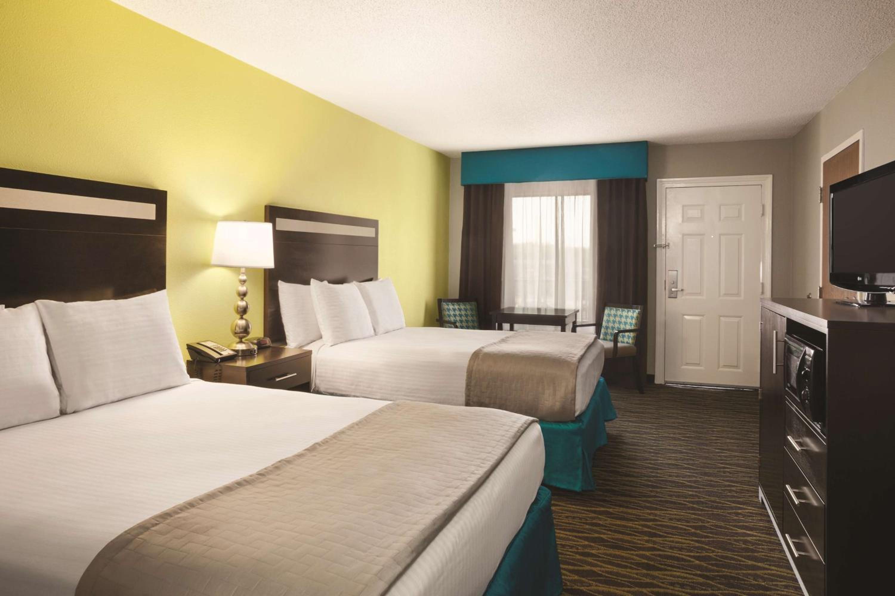 Queen Room with Two Queen Beds - Photo 1